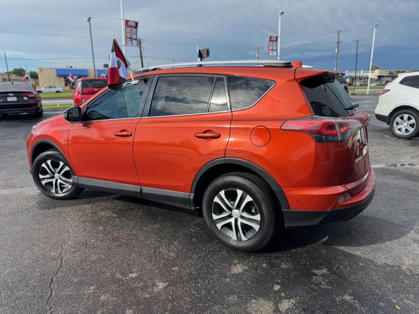 2016 ORANGE TOYOTA RAV4 LE (2T3ZFREVXGW) , located at 10740 Forest Lane, Dallas, TX, 75243, (972) 272-7300, 32.908588, -96.701813 - Photo#5