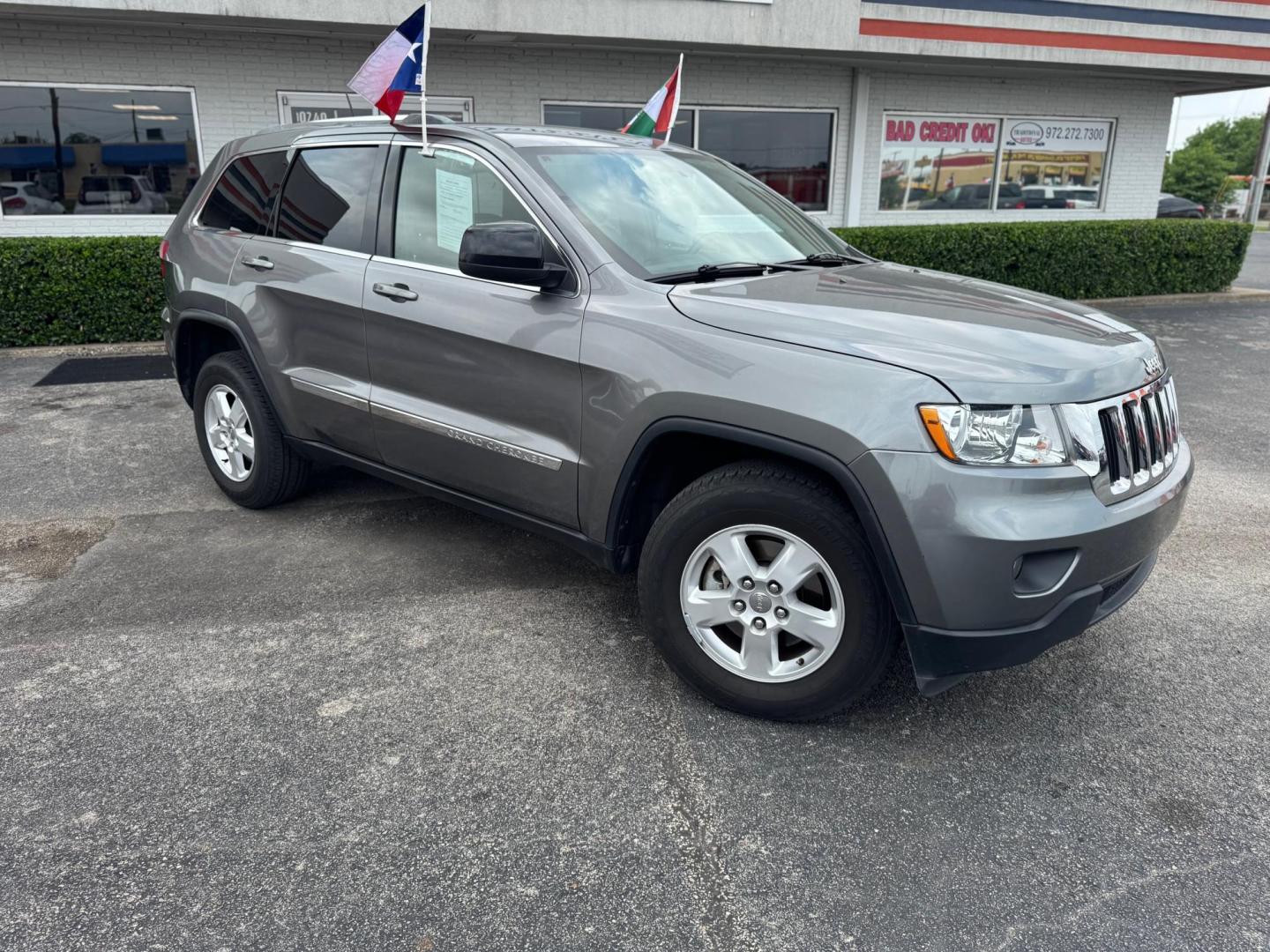 2012 GRAY JEEP GRAND CHEROKEE LARED (1C4RJEAG0CC) , located at 10740 Forest Lane, Dallas, TX, 75243, (972) 272-7300, 32.908588, -96.701813 - Photo#1