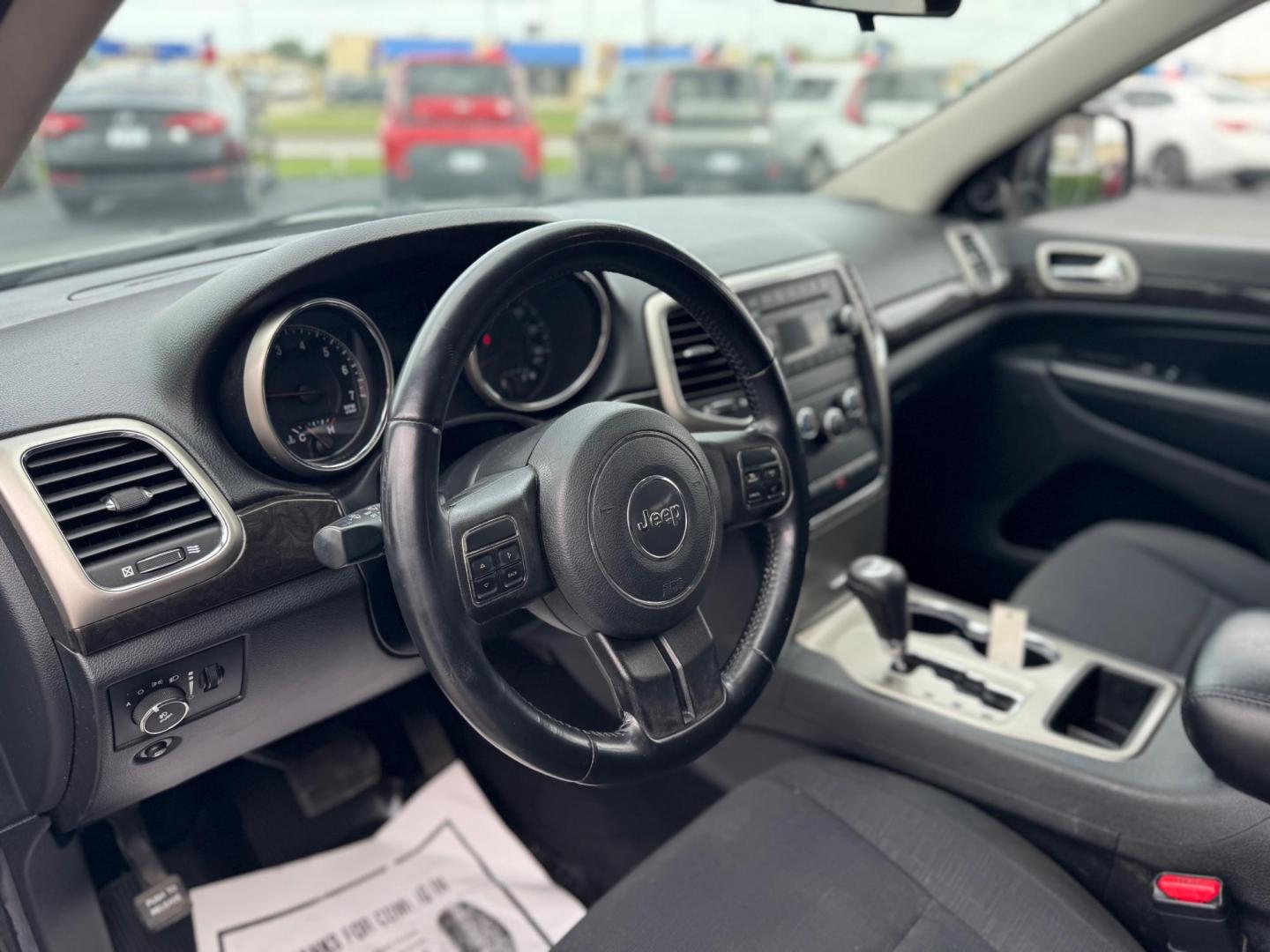 2012 GRAY JEEP GRAND CHEROKEE LARED (1C4RJEAG0CC) , located at 10740 Forest Lane, Dallas, TX, 75243, (972) 272-7300, 32.908588, -96.701813 - Photo#9