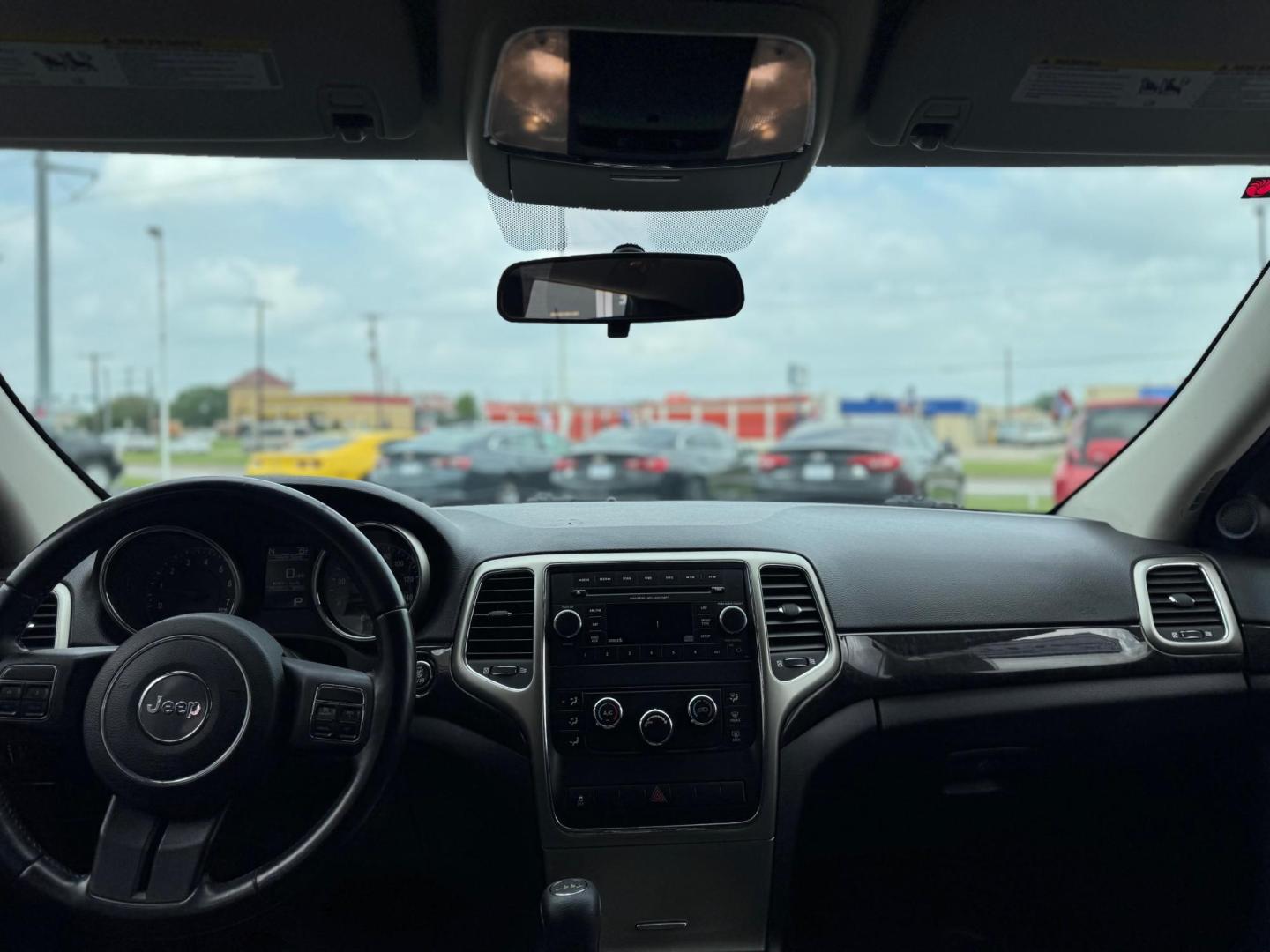 2012 GRAY JEEP GRAND CHEROKEE LARED (1C4RJEAG0CC) , located at 10740 Forest Lane, Dallas, TX, 75243, (972) 272-7300, 32.908588, -96.701813 - Photo#7