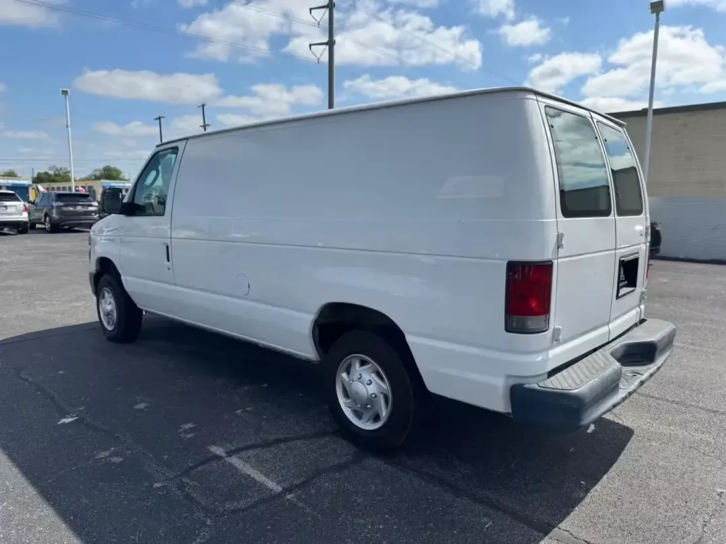 2012 WHITE Ford E-Series Van E-150 (1FTNE1EW9CD) with an 4.6L V8 SOHC 16V engine, 4-Speed Automatic transmission, located at 10740 Forest Lane, Dallas, TX, 75243, (972) 272-7300, 32.908588, -96.701813 - Are you a business owner in need of a reliable workhorse, or perhaps a weekend adventurer seeking the perfect cargo van for your next trip? Look no further than this 2012 Ford E-Series Van, available now at Traditional Autos, your trusted pre-owned dealership located at 10740 Forest Lane, Dallas, TX - Photo#15