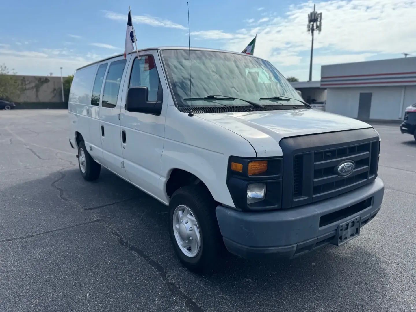 2012 WHITE Ford E-Series Van E-150 (1FTNE1EW9CD) with an 4.6L V8 SOHC 16V engine, 4-Speed Automatic transmission, located at 10740 Forest Lane, Dallas, TX, 75243, (972) 272-7300, 32.908588, -96.701813 - Are you a business owner in need of a reliable workhorse, or perhaps a weekend adventurer seeking the perfect cargo van for your next trip? Look no further than this 2012 Ford E-Series Van, available now at Traditional Autos, your trusted pre-owned dealership located at 10740 Forest Lane, Dallas, TX - Photo#2