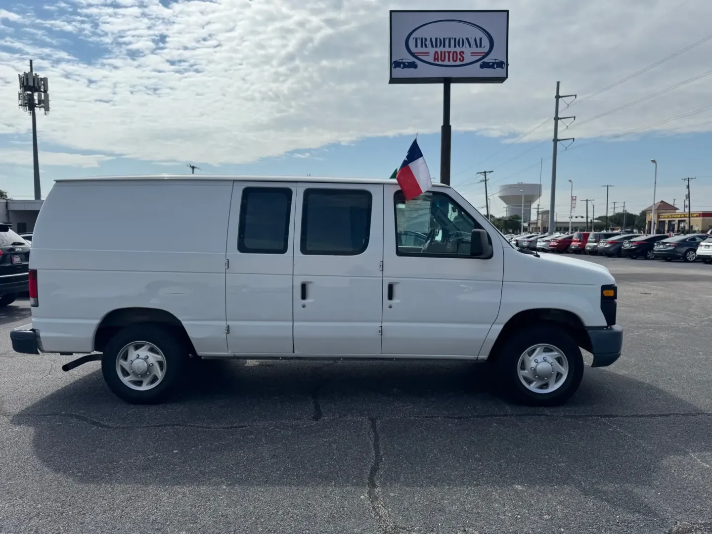 2012 WHITE Ford E-Series Van E-150 (1FTNE1EW9CD) with an 4.6L V8 SOHC 16V engine, 4-Speed Automatic transmission, located at 10740 Forest Lane, Dallas, TX, 75243, (972) 272-7300, 32.908588, -96.701813 - Are you a business owner in need of a reliable workhorse, or perhaps a weekend adventurer seeking the perfect cargo van for your next trip? Look no further than this 2012 Ford E-Series Van, available now at Traditional Autos, your trusted pre-owned dealership located at 10740 Forest Lane, Dallas, TX - Photo#3