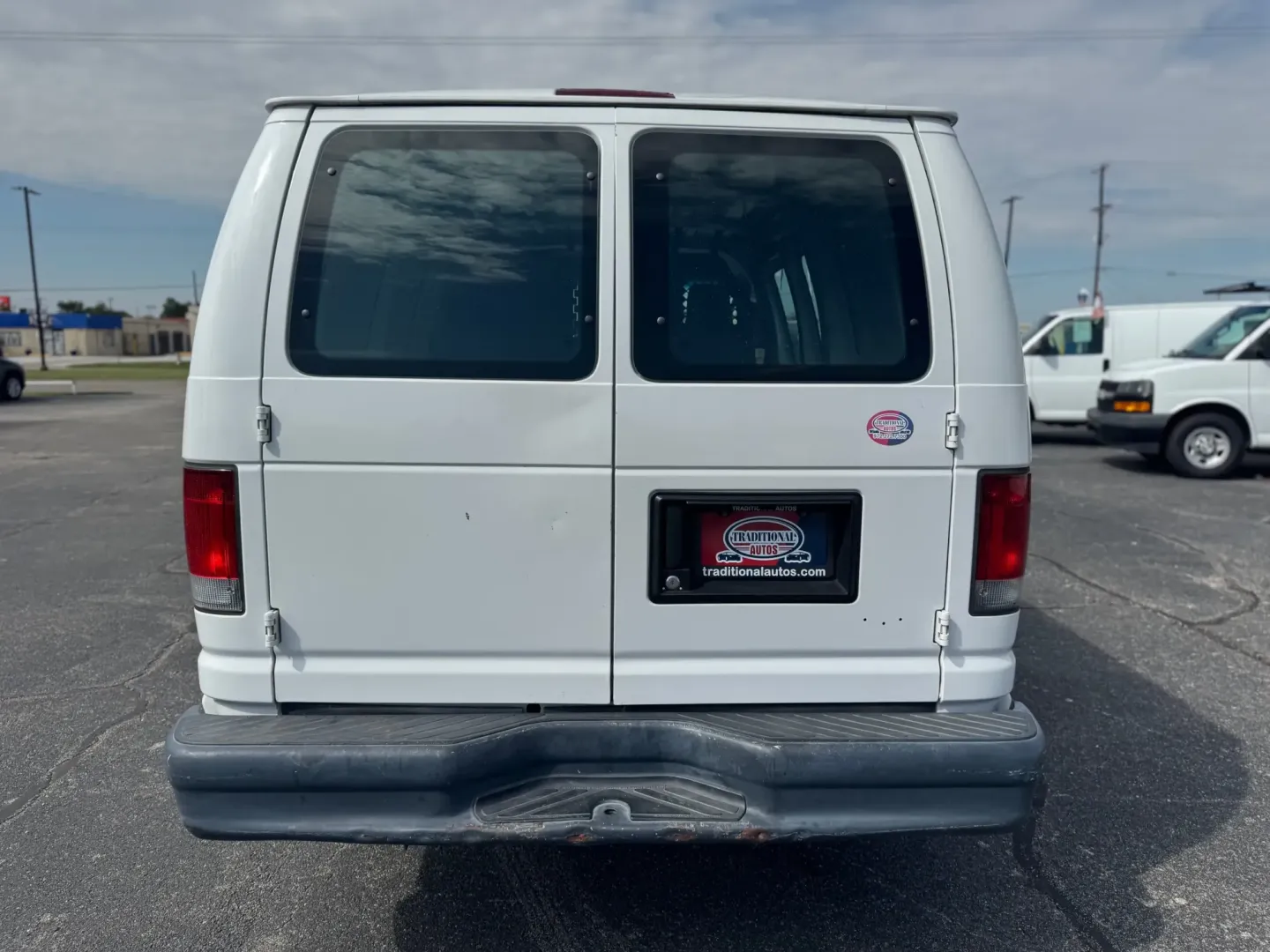 2012 WHITE Ford E-Series Van E-150 (1FTNE1EW9CD) with an 4.6L V8 SOHC 16V engine, 4-Speed Automatic transmission, located at 10740 Forest Lane, Dallas, TX, 75243, (972) 272-7300, 32.908588, -96.701813 - Are you a business owner in need of a reliable workhorse, or perhaps a weekend adventurer seeking the perfect cargo van for your next trip? Look no further than this 2012 Ford E-Series Van, available now at Traditional Autos, your trusted pre-owned dealership located at 10740 Forest Lane, Dallas, TX - Photo#4