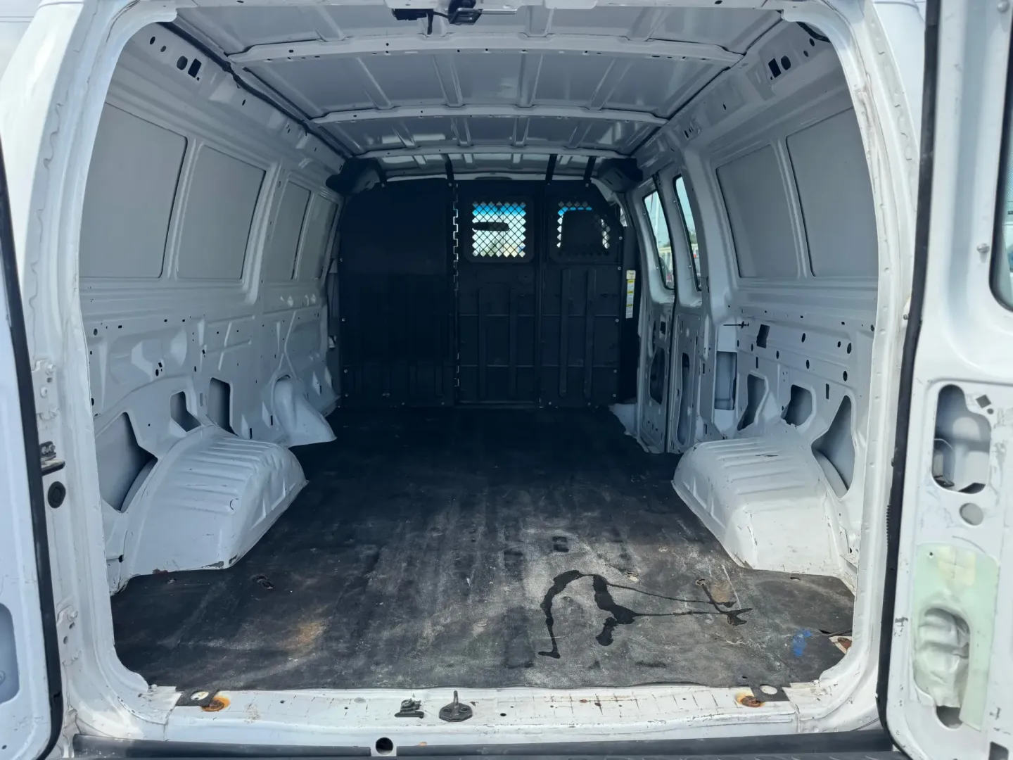 2012 WHITE Ford E-Series Van E-150 (1FTNE1EW9CD) with an 4.6L V8 SOHC 16V engine, 4-Speed Automatic transmission, located at 10740 Forest Lane, Dallas, TX, 75243, (972) 272-7300, 32.908588, -96.701813 - Are you a business owner in need of a reliable workhorse, or perhaps a weekend adventurer seeking the perfect cargo van for your next trip? Look no further than this 2012 Ford E-Series Van, available now at Traditional Autos, your trusted pre-owned dealership located at 10740 Forest Lane, Dallas, TX - Photo#5