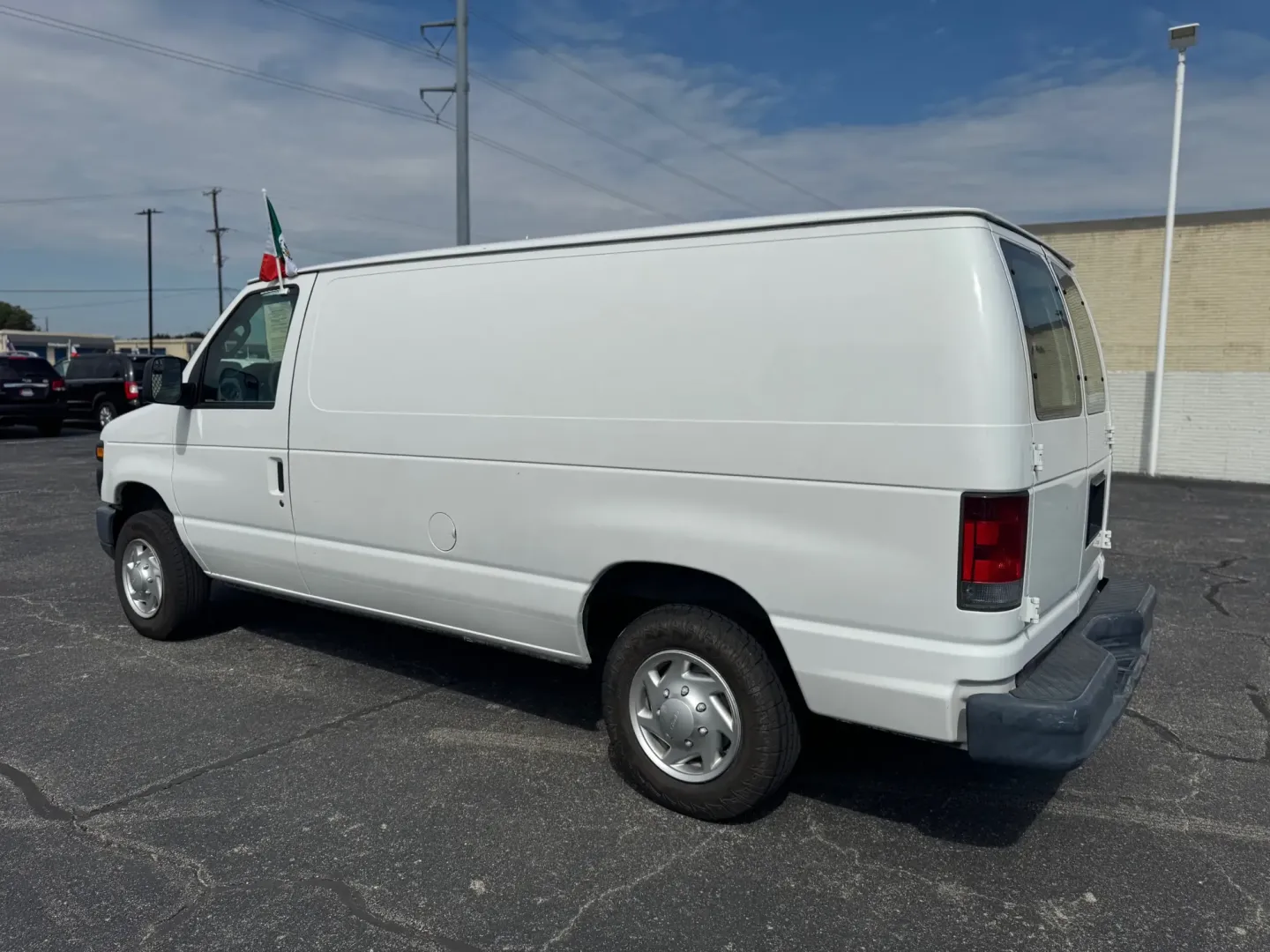 2012 WHITE Ford E-Series Van E-150 (1FTNE1EW9CD) with an 4.6L V8 SOHC 16V engine, 4-Speed Automatic transmission, located at 10740 Forest Lane, Dallas, TX, 75243, (972) 272-7300, 32.908588, -96.701813 - Are you a business owner in need of a reliable workhorse, or perhaps a weekend adventurer seeking the perfect cargo van for your next trip? Look no further than this 2012 Ford E-Series Van, available now at Traditional Autos, your trusted pre-owned dealership located at 10740 Forest Lane, Dallas, TX - Photo#6