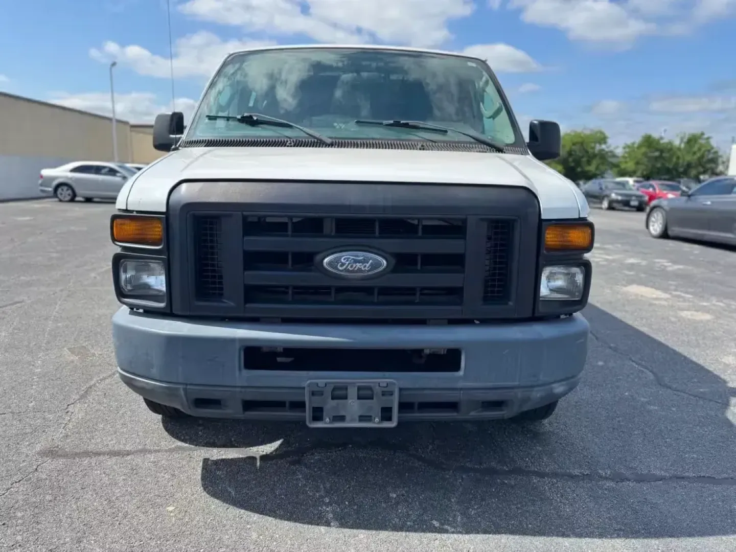 2012 WHITE Ford E-Series Van E-150 (1FTNE1EW9CD) with an 4.6L V8 SOHC 16V engine, 4-Speed Automatic transmission, located at 10740 Forest Lane, Dallas, TX, 75243, (972) 272-7300, 32.908588, -96.701813 - Are you a business owner in need of a reliable workhorse, or perhaps a weekend adventurer seeking the perfect cargo van for your next trip? Look no further than this 2012 Ford E-Series Van, available now at Traditional Autos, your trusted pre-owned dealership located at 10740 Forest Lane, Dallas, TX - Photo#8