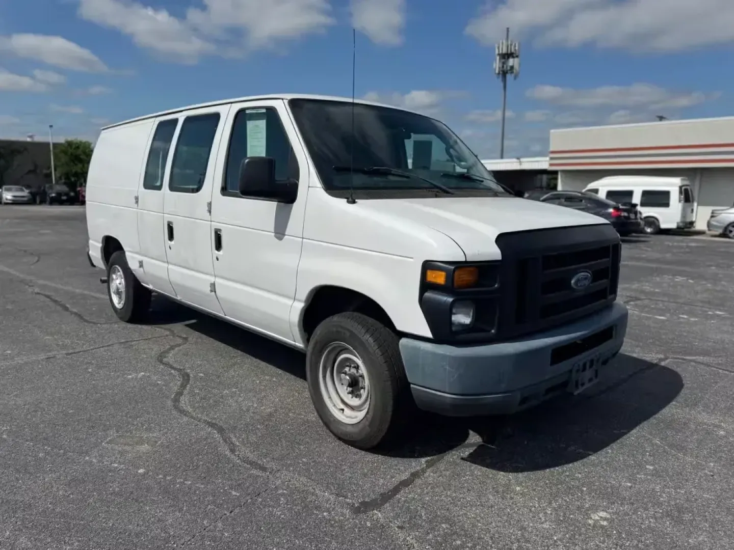 2012 WHITE Ford E-Series Van E-150 (1FTNE1EW9CD) with an 4.6L V8 SOHC 16V engine, 4-Speed Automatic transmission, located at 10740 Forest Lane, Dallas, TX, 75243, (972) 272-7300, 32.908588, -96.701813 - Are you a business owner in need of a reliable workhorse, or perhaps a weekend adventurer seeking the perfect cargo van for your next trip? Look no further than this 2012 Ford E-Series Van, available now at Traditional Autos, your trusted pre-owned dealership located at 10740 Forest Lane, Dallas, TX - Photo#9