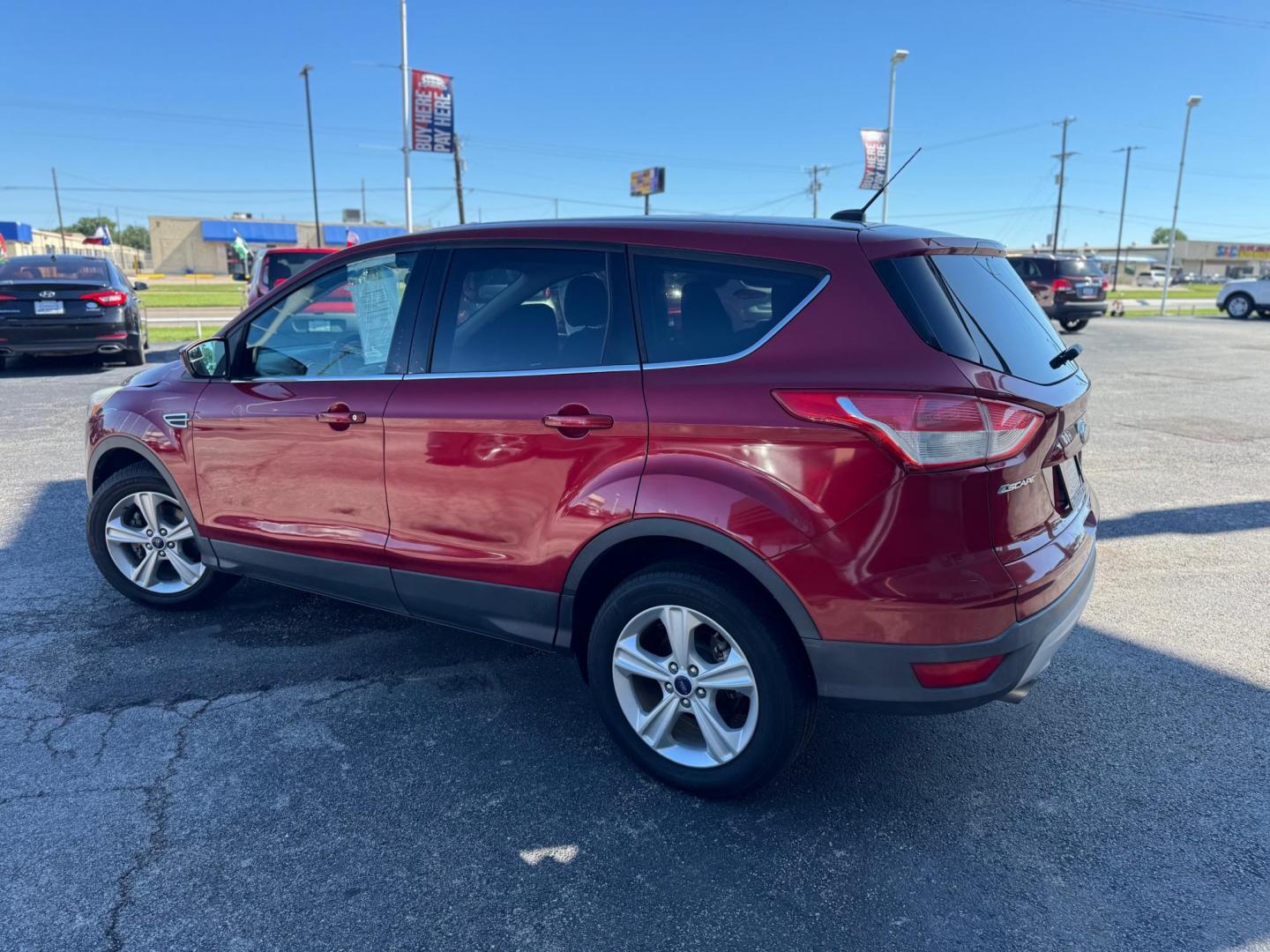 2014 MAROON FORD ESCAPE SE (1FMCU0GX9EU) , located at 10740 Forest Lane, Dallas, TX, 75243, (972) 272-7300, 32.908588, -96.701813 - Photo#5