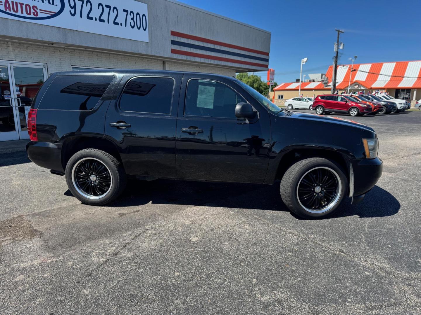 2009 BLACK CHEVROLET TAHOE LT (1GNFC230X9R) , located at 10740 Forest Lane, Dallas, TX, 75243, (972) 272-7300, 32.908588, -96.701813 - Photo#2