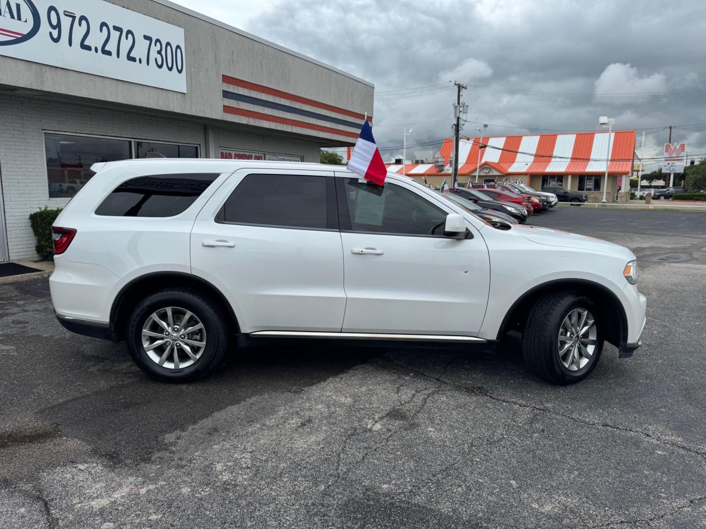 2017 WHITE DODGE DURANGO SXT (1C4RDHAG9HC) , located at 10740 Forest Lane, Dallas, TX, 75243, (972) 272-7300, 32.908588, -96.701813 - Photo#2