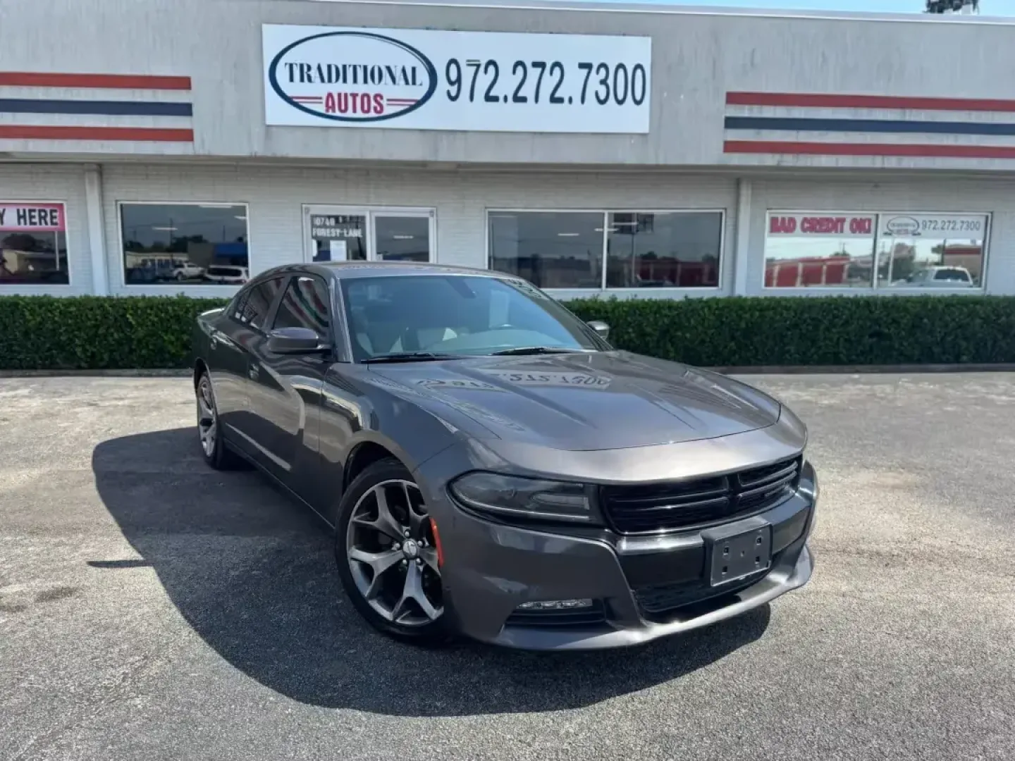 2015 GRAY Dodge Charger SXT (2C3CDXHG1FH) with an 3.6L V6 DOHC 24V engine, 8-Speed Automatic transmission, located at 10740 Forest Lane, Dallas, TX, 75243, (972) 272-7300, 32.908588, -96.701813 - **Unleash Your Inner Adventurer with the 2015 Dodge Charger SXT at Traditional Autos in Dallas, TX!**<br /> <br /> Are you ready to elevate your driving experience? This 2015 Dodge Charger SXT is not just a car; it's a lifestyle choice. Perfect for those who crave excitement on the road, this sleek - Photo#1