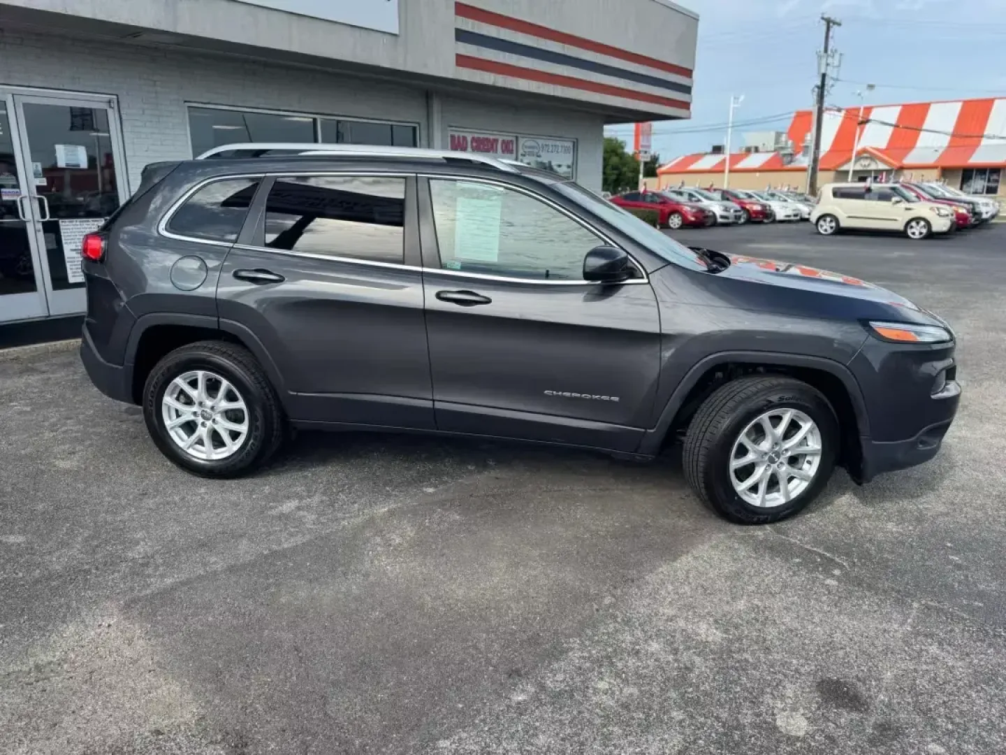 2016 BLACK Jeep Cherokee Latitude 4WD (1C4PJMCS3GW) with an 3.2L V6 DOHC 24V engine, 9-Speed Automatic transmission, located at 10740 Forest Lane, Dallas, TX, 75243, (972) 272-7300, 32.908588, -96.701813 - **Explore the Open Road with Confidence in This 2016 Jeep Cherokee Latitude 4WD!**<br /> <br /> Are you ready to elevate your weekend adventures or tackle your daily commute with ease? The 2016 Jeep Cherokee Latitude 4WD is the perfect blend of rugged capability and modern comfort, making it an idea - Photo#2
