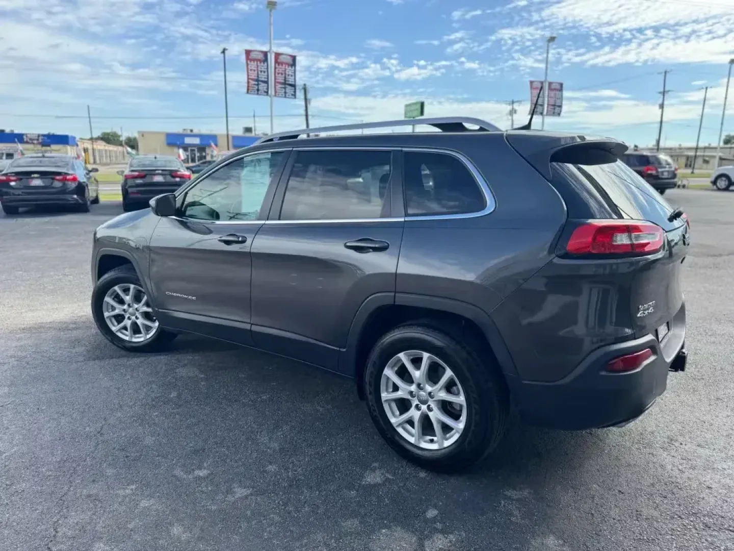 2016 BLACK Jeep Cherokee Latitude 4WD (1C4PJMCS3GW) with an 3.2L V6 DOHC 24V engine, 9-Speed Automatic transmission, located at 10740 Forest Lane, Dallas, TX, 75243, (972) 272-7300, 32.908588, -96.701813 - **Explore the Open Road with Confidence in This 2016 Jeep Cherokee Latitude 4WD!**<br /> <br /> Are you ready to elevate your weekend adventures or tackle your daily commute with ease? The 2016 Jeep Cherokee Latitude 4WD is the perfect blend of rugged capability and modern comfort, making it an idea - Photo#4