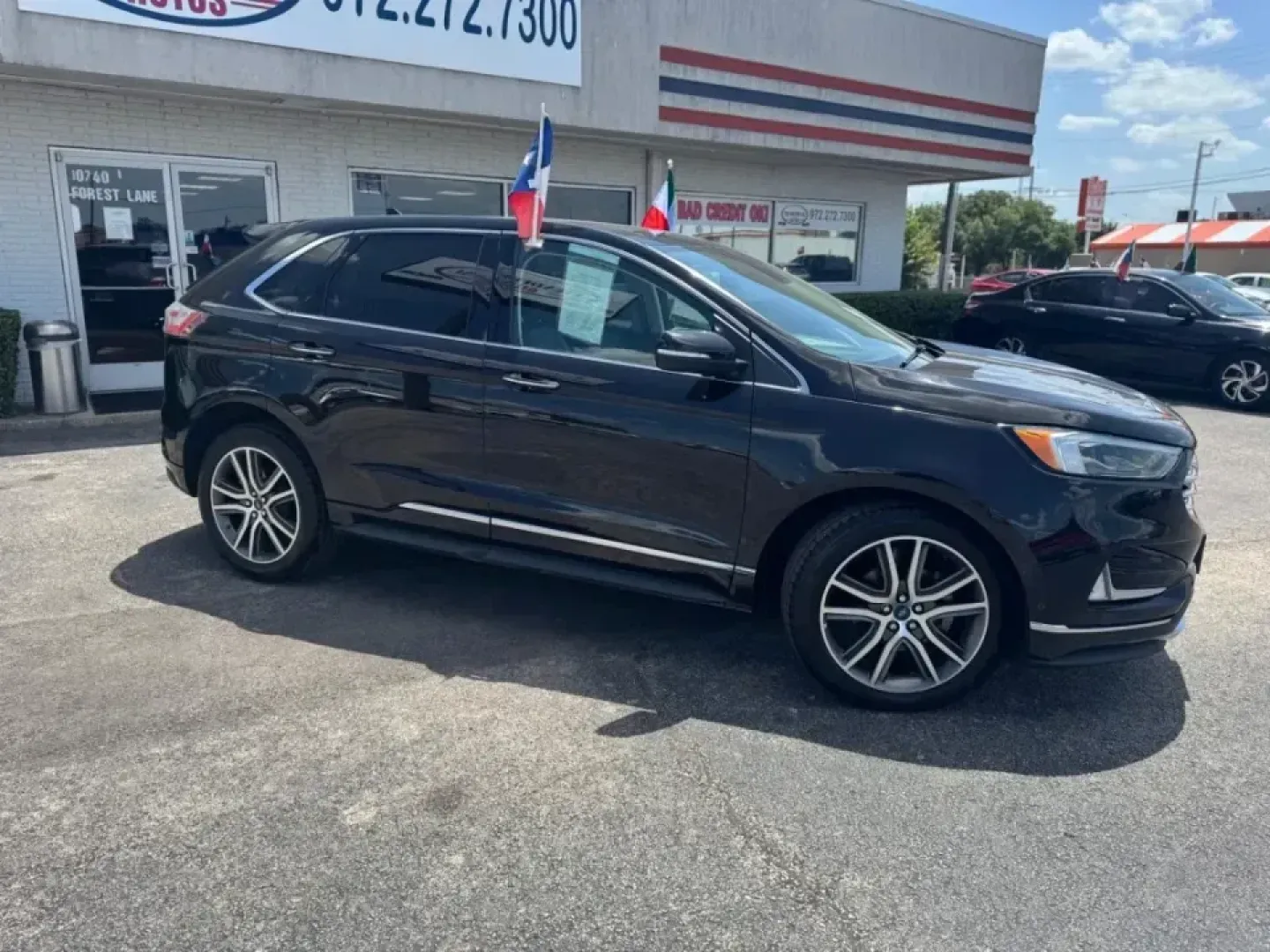 2019 BLACK Ford Edge Titanium (2FMPK3K97KB) with an 2.0L L4 DOHC 16V engine, 6A transmission, located at 10740 Forest Lane, Dallas, TX, 75243, (972) 272-7300, 32.908588, -96.701813 - **Explore the Open Road with the 2019 Ford Edge Titanium SUV - Perfect for Your Next Adventure!**<br /> <br /> Are you ready to embark on your next adventure or simply elevate your daily commute? The 2019 Ford Edge Titanium SUV is your ticket to freedom, combining style, comfort, and performance in - Photo#1