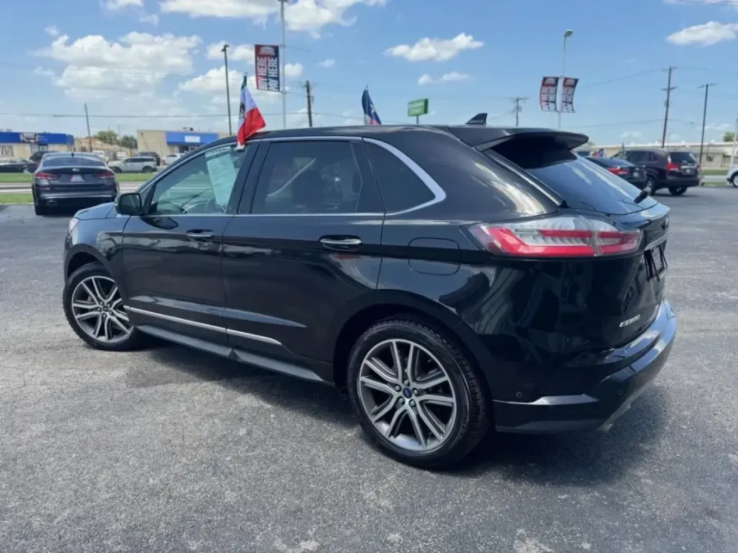 2019 BLACK Ford Edge Titanium (2FMPK3K97KB) with an 2.0L L4 DOHC 16V engine, 6A transmission, located at 10740 Forest Lane, Dallas, TX, 75243, (972) 272-7300, 32.908588, -96.701813 - **Explore the Open Road with the 2019 Ford Edge Titanium SUV - Perfect for Your Next Adventure!**<br /> <br /> Are you ready to embark on your next adventure or simply elevate your daily commute? The 2019 Ford Edge Titanium SUV is your ticket to freedom, combining style, comfort, and performance in - Photo#2