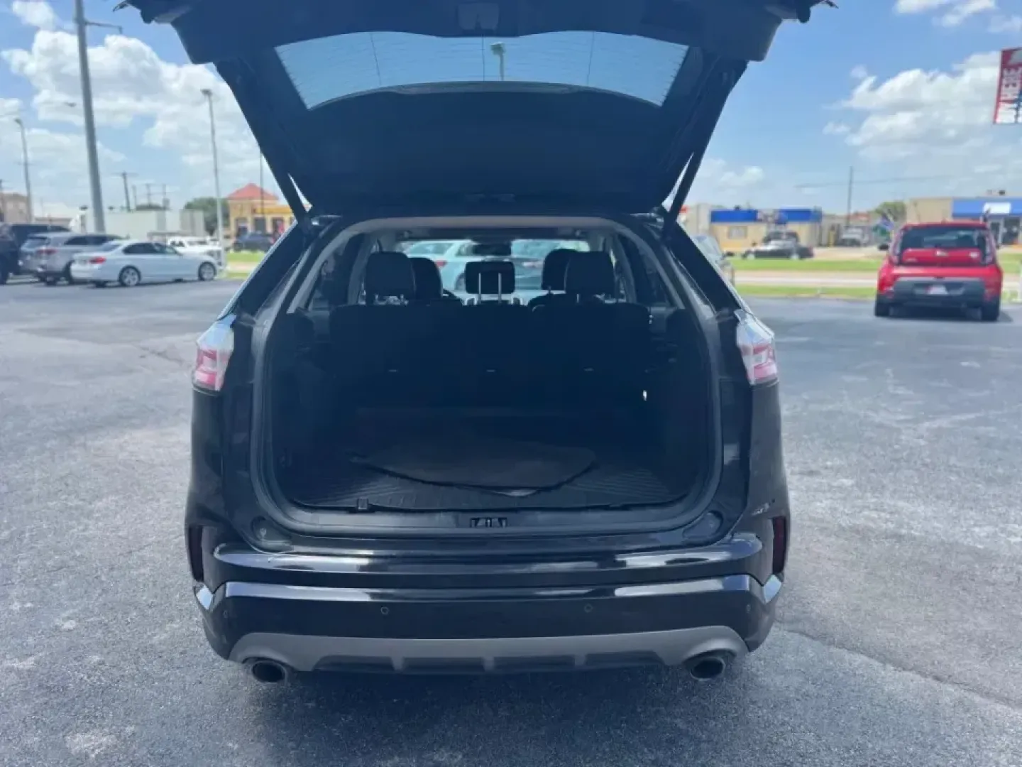 2019 BLACK Ford Edge Titanium (2FMPK3K97KB) with an 2.0L L4 DOHC 16V engine, 6A transmission, located at 10740 Forest Lane, Dallas, TX, 75243, (972) 272-7300, 32.908588, -96.701813 - **Explore the Open Road with the 2019 Ford Edge Titanium SUV - Perfect for Your Next Adventure!**<br /> <br /> Are you ready to embark on your next adventure or simply elevate your daily commute? The 2019 Ford Edge Titanium SUV is your ticket to freedom, combining style, comfort, and performance in - Photo#4