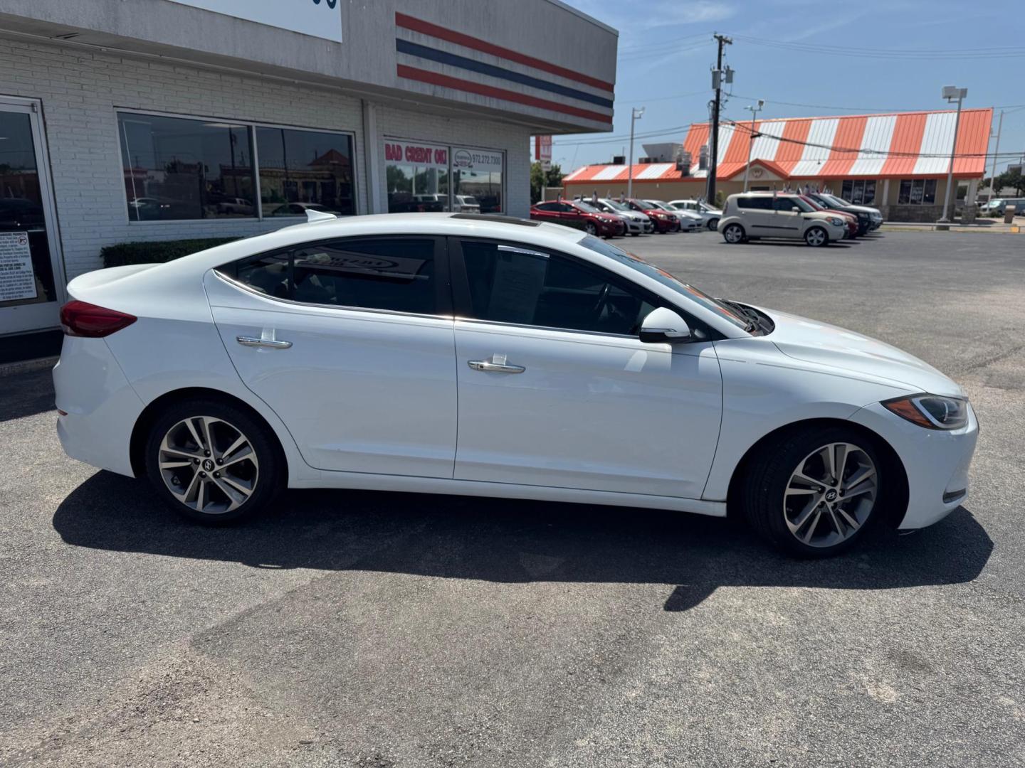 2017 WHITE HYUNDAI ELANTRA LIMITED; SE (5NPD84LF0HH) , located at 10740 Forest Lane, Dallas, TX, 75243, (972) 272-7300, 32.908588, -96.701813 - Photo#2