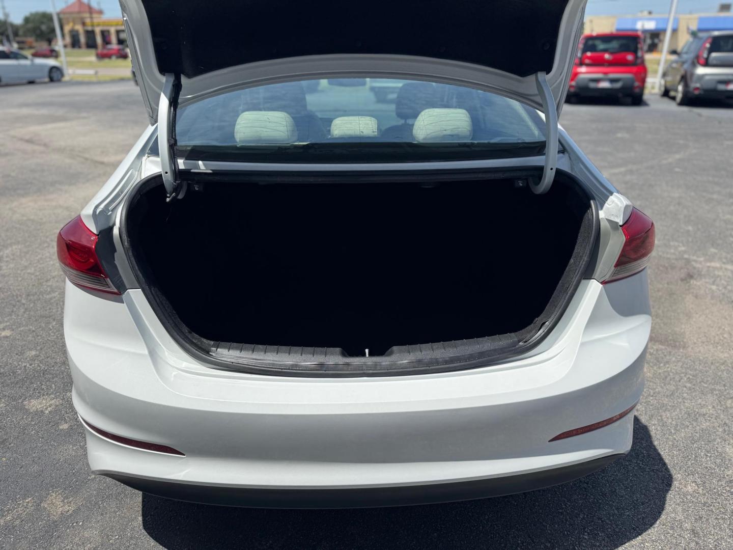 2017 WHITE HYUNDAI ELANTRA LIMITED; SE (5NPD84LF0HH) , located at 10740 Forest Lane, Dallas, TX, 75243, (972) 272-7300, 32.908588, -96.701813 - Photo#4