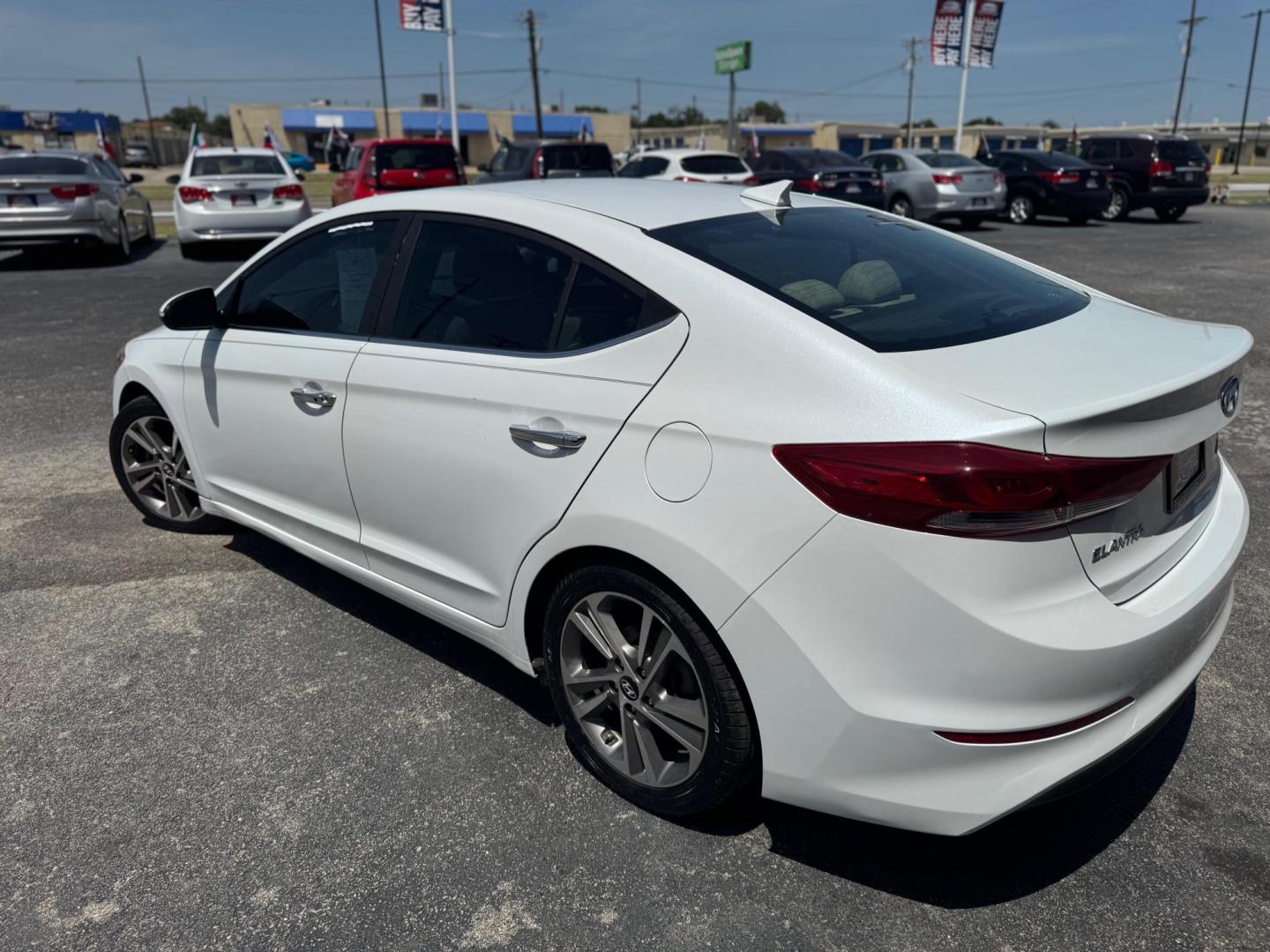 2017 WHITE HYUNDAI ELANTRA LIMITED; SE (5NPD84LF0HH) , located at 10740 Forest Lane, Dallas, TX, 75243, (972) 272-7300, 32.908588, -96.701813 - Photo#5
