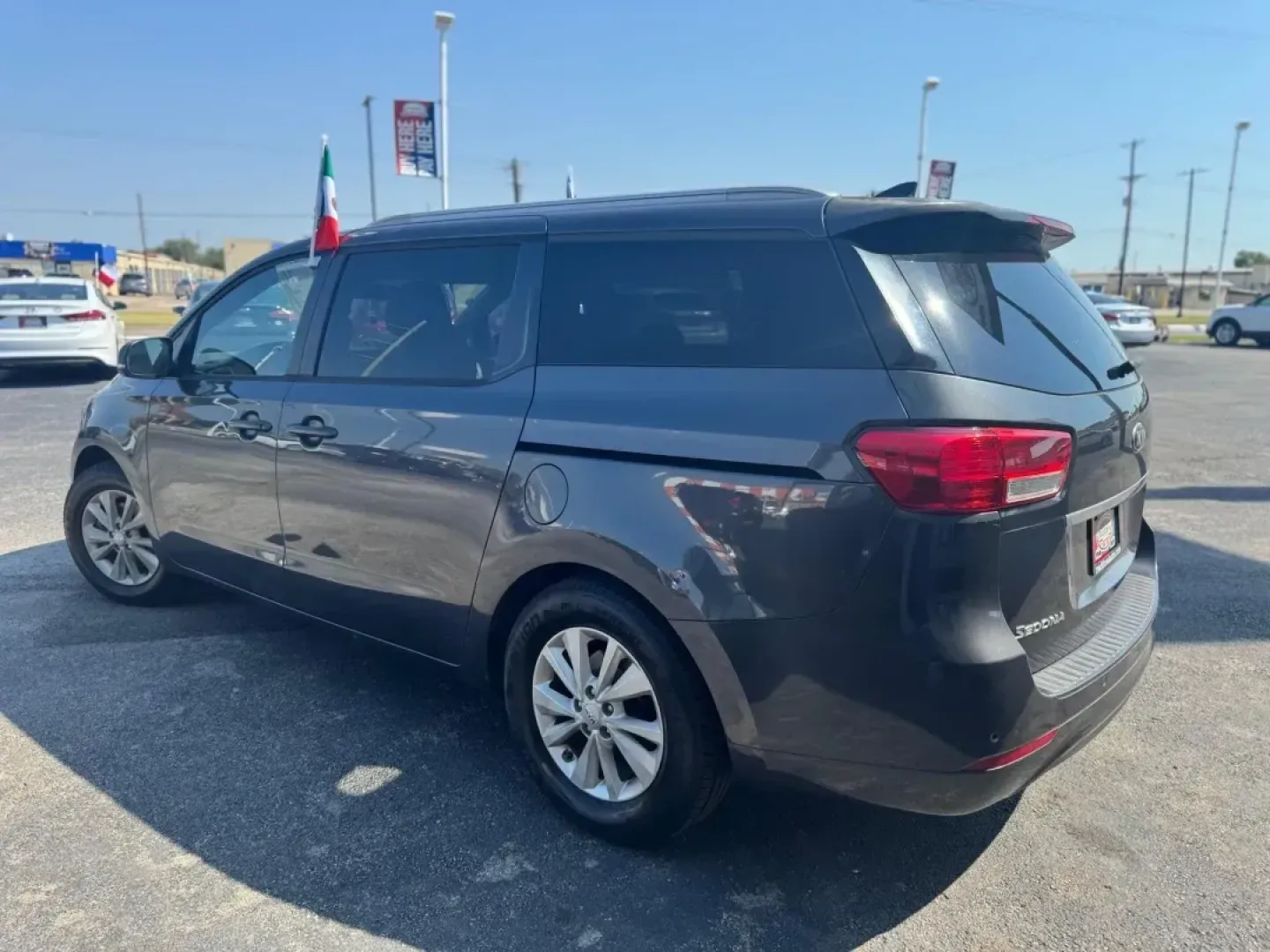 2016 GRAY Kia Sedona LX (KNDMB5C15G6) with an 3.3L V6 DOHC 24V engine, 6-Speed Automatic transmission, located at 10740 Forest Lane, Dallas, TX, 75243, (972) 272-7300, 32.908588, -96.701813 - **Experience Family Adventures with This 2016 Kia Sedona LX** <br /> <br /> If your life revolves around family outings, school runs, and weekend adventures, this stunning 2016 Kia Sedona LX is the perfect companion for your journey. With ample space, advanced safety features, and a comfortable rid - Photo#2