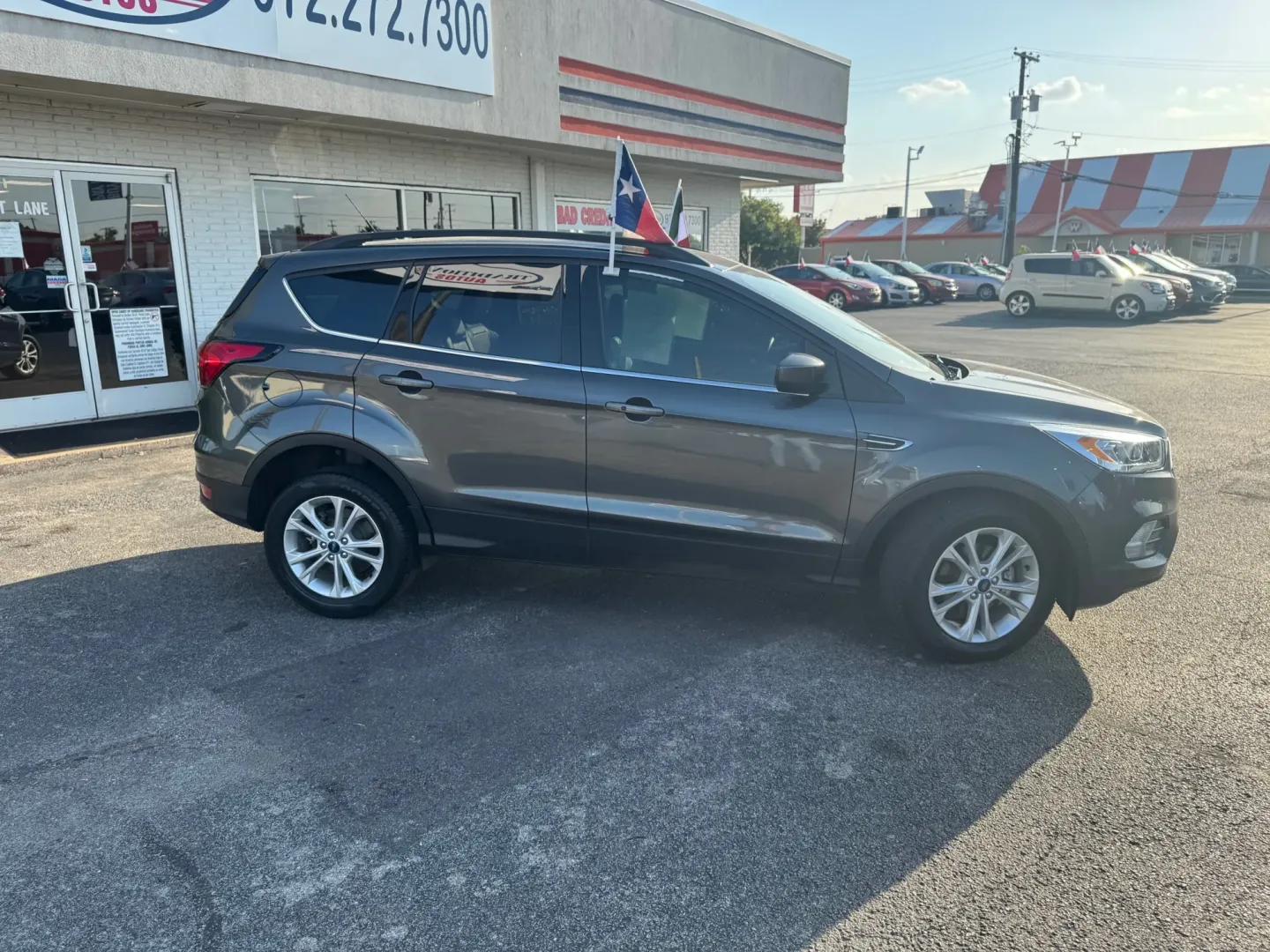 2019 Ford Escape SEL FWD (1FMCU0HD0KU) with an 1.5L L4 DOHC 16V engine, 6A transmission, located at 10740 Forest Lane, Dallas, TX, 75243, (972) 272-7300, 32.908588, -96.701813 - **Discover Your Next Adventure with This 2019 Ford Escape at Traditional Autos!**<br /> <br /> Are you seeking a versatile and reliable vehicle for your next family road trip or daily commute? Look no further than this 2019 Ford Escape, now available at Traditional Autos in Dallas, TX. This sport ut - Photo#2