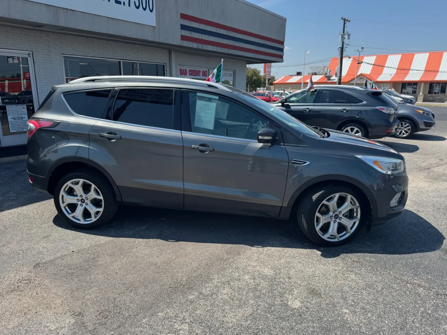 2017 Ford Escape Titanium FWD (1FMCU0J98HU) with an 2.0L L4 DOHC 16V engine, 6A transmission, located at 10740 Forest Lane, Dallas, TX, 75243, (972) 272-7300, 32.908588, -96.701813 - Are you in search of a reliable and versatile vehicle that perfectly fits your active lifestyle? Look no further than this stunning **2017 Ford Escape**, an SUV designed for those who crave adventure without compromising on comfort or safety. From daily commutes in bustling Dallas to weekend getaway - Photo#1