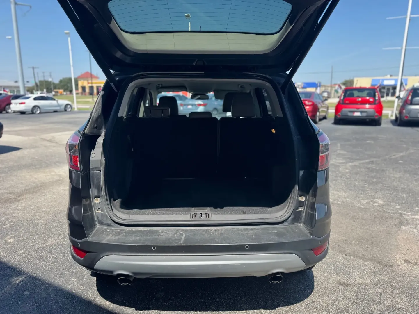 2017 Ford Escape Titanium FWD (1FMCU0J98HU) with an 2.0L L4 DOHC 16V engine, 6A transmission, located at 10740 Forest Lane, Dallas, TX, 75243, (972) 272-7300, 32.908588, -96.701813 - Are you in search of a reliable and versatile vehicle that perfectly fits your active lifestyle? Look no further than this stunning **2017 Ford Escape**, an SUV designed for those who crave adventure without compromising on comfort or safety. From daily commutes in bustling Dallas to weekend getaway - Photo#3