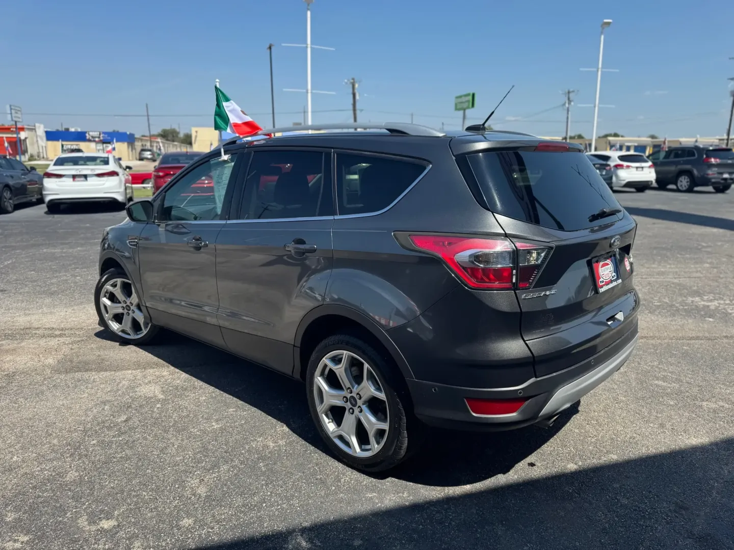 2017 Ford Escape Titanium FWD (1FMCU0J98HU) with an 2.0L L4 DOHC 16V engine, 6A transmission, located at 10740 Forest Lane, Dallas, TX, 75243, (972) 272-7300, 32.908588, -96.701813 - Are you in search of a reliable and versatile vehicle that perfectly fits your active lifestyle? Look no further than this stunning **2017 Ford Escape**, an SUV designed for those who crave adventure without compromising on comfort or safety. From daily commutes in bustling Dallas to weekend getaway - Photo#4