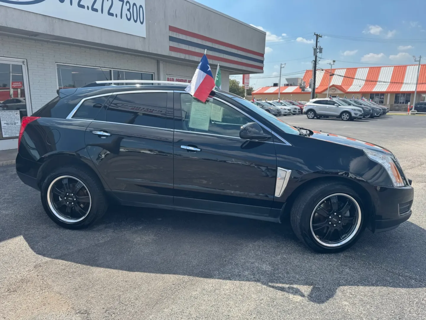 2013 Cadillac SRX Base (3GYFNGE39DS) with an 3.6L V6 DOHC 24V FFV engine, 6-Speed Automatic transmission, located at 10740 Forest Lane, Dallas, TX, 75243, (972) 272-7300, 32.908588, -96.701813 - **Experience Luxurious Comfort and Versatile Performance with the 2013 Cadillac SRX!**<br /> <br /> Are you searching for a stylish and spacious SUV that can elevate your daily commute and weekend getaways? Look no further! The 2013 Cadillac SRX is the perfect blend of luxury and practicality, makin - Photo#2