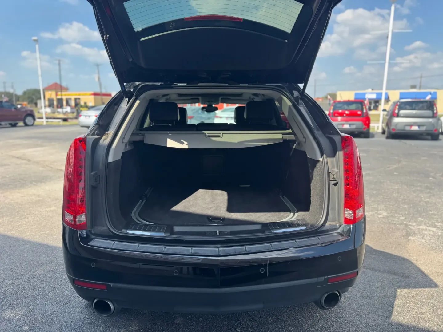 2013 Cadillac SRX Base (3GYFNGE39DS) with an 3.6L V6 DOHC 24V FFV engine, 6-Speed Automatic transmission, located at 10740 Forest Lane, Dallas, TX, 75243, (972) 272-7300, 32.908588, -96.701813 - **Experience Luxurious Comfort and Versatile Performance with the 2013 Cadillac SRX!**<br /> <br /> Are you searching for a stylish and spacious SUV that can elevate your daily commute and weekend getaways? Look no further! The 2013 Cadillac SRX is the perfect blend of luxury and practicality, makin - Photo#4
