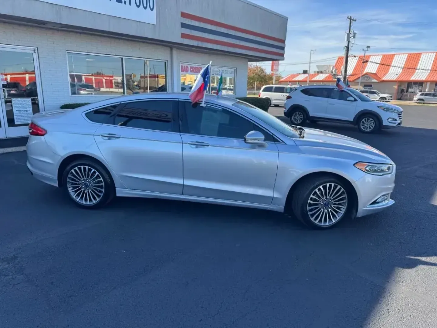 2017 Ford Fusion Titanium (3FA6P0K97HR) with an 2.0L L4 DOHC 16V engine, 6A transmission, located at 10740 Forest Lane, Dallas, TX, 75243, (972) 272-7300, 32.908588, -96.701813 - **Embrace Your Next Adventure with the 2017 Ford Fusion!**<br /> <br /> Are you searching for the perfect blend of style, comfort, and technology for your daily commute or weekend road trips? Look no further than the 2017 Ford Fusion, a sleek sedan designed to elevate your driving experience. With a - Photo#2