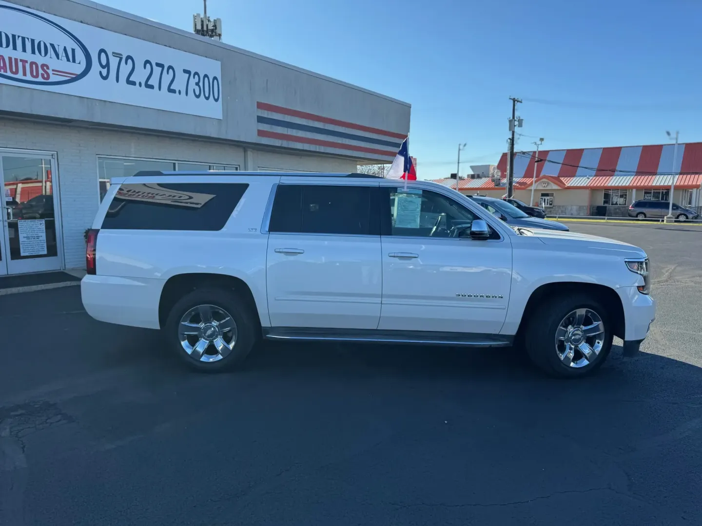 2016 Chevrolet Suburban LTZ 2WD (1GNSCJKC0GR) with an 5.3L V8 OHV 16V engine, 6A transmission, located at 10740 Forest Lane, Dallas, TX, 75243, (972) 272-7300, 32.908588, -96.701813 - Embrace the open road and elevate your weekend adventures with the incredible 2016 Chevrolet Suburban, available now at Traditional Autos in Dallas, TX. Whether you're planning a family road trip, running errands around city neighborhoods, or navigating the bustling highways of North Texas, this spa - Photo#2