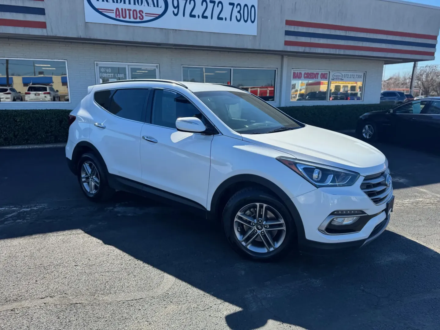 2018 Hyundai Santa Fe Sport 2.4 FWD (5NMZU3LB0JH) with an 2.4L L4 DOHC 16V engine, 6A transmission, located at 10740 Forest Lane, Dallas, TX, 75243, (972) 272-7300, 32.908588, -96.701813 - Weekend road trips to White Rock Lake, daily commuting up US-75, or shuttling the kids between Lake Highlands and Richardson-this 2018 Hyundai Santa Fe is the kind of SUV that fits real Dallas life. With versatile space, confidence-inspiring safety features, and comfort for long drives, it's a smart - Photo#1