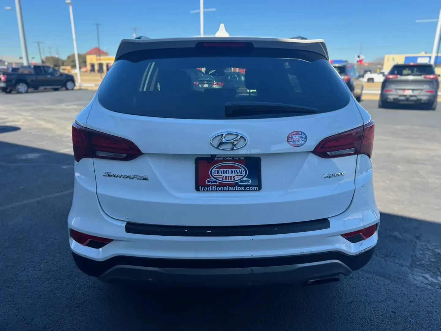 2018 Hyundai Santa Fe Sport 2.4 FWD (5NMZU3LB0JH) with an 2.4L L4 DOHC 16V engine, 6A transmission, located at 10740 Forest Lane, Dallas, TX, 75243, (972) 272-7300, 32.908588, -96.701813 - Weekend road trips to White Rock Lake, daily commuting up US-75, or shuttling the kids between Lake Highlands and Richardson-this 2018 Hyundai Santa Fe is the kind of SUV that fits real Dallas life. With versatile space, confidence-inspiring safety features, and comfort for long drives, it's a smart - Photo#2