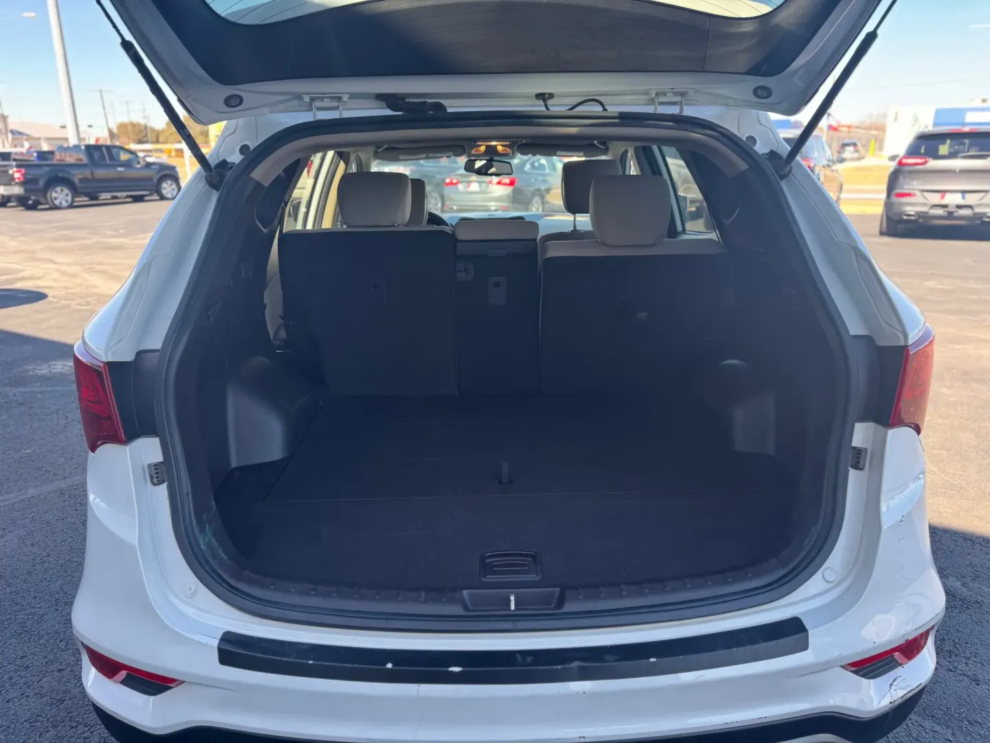 2018 Hyundai Santa Fe Sport 2.4 FWD (5NMZU3LB0JH) with an 2.4L L4 DOHC 16V engine, 6A transmission, located at 10740 Forest Lane, Dallas, TX, 75243, (972) 272-7300, 32.908588, -96.701813 - Weekend road trips to White Rock Lake, daily commuting up US-75, or shuttling the kids between Lake Highlands and Richardson-this 2018 Hyundai Santa Fe is the kind of SUV that fits real Dallas life. With versatile space, confidence-inspiring safety features, and comfort for long drives, it's a smart - Photo#3