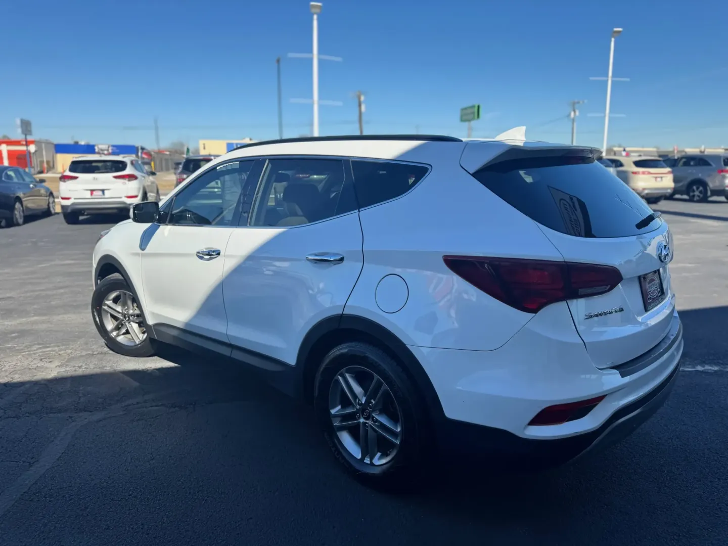 2018 Hyundai Santa Fe Sport 2.4 FWD (5NMZU3LB0JH) with an 2.4L L4 DOHC 16V engine, 6A transmission, located at 10740 Forest Lane, Dallas, TX, 75243, (972) 272-7300, 32.908588, -96.701813 - Weekend road trips to White Rock Lake, daily commuting up US-75, or shuttling the kids between Lake Highlands and Richardson-this 2018 Hyundai Santa Fe is the kind of SUV that fits real Dallas life. With versatile space, confidence-inspiring safety features, and comfort for long drives, it's a smart - Photo#4