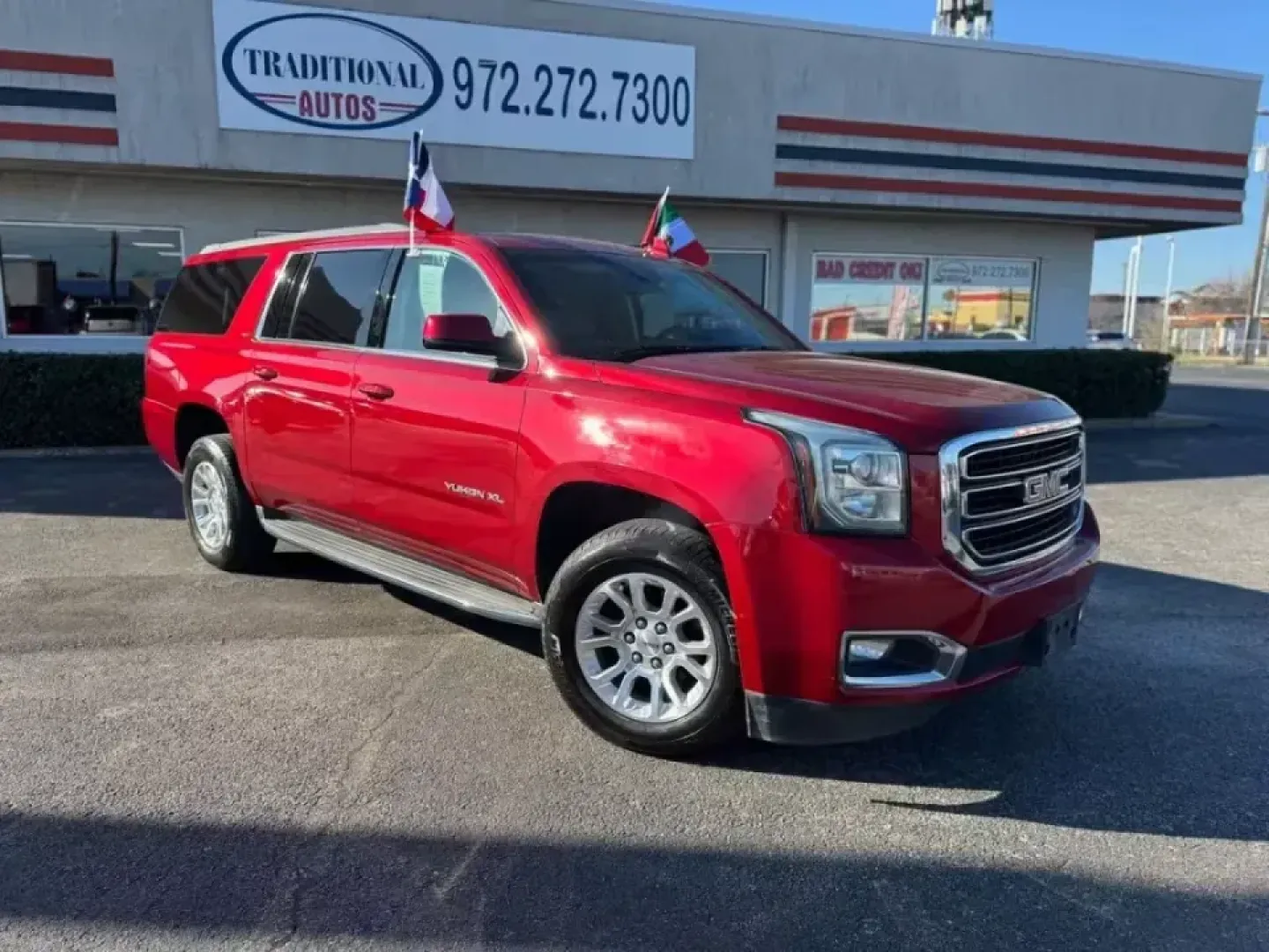 2015 RED GMC Yukon SLT 1/2 Ton 2WD (1GKS1HKC5FR) with an 5.3L V8 OHV 16V engine, 6-Speed Automatic transmission, located at 10740 Forest Lane, Dallas, TX, 75243, (972) 272-7300, 32.908588, -96.701813 - **Explore Adventure with the 2015 GMC Yukon XL: Your Family's Perfect Companion!**<br /> <br /> Are you ready to take on family road trips, weekend getaways, or even just your daily commute with style and comfort? Look no further than the 2015 GMC Yukon XL, a spacious and versatile SUV that perfectl - Photo#1