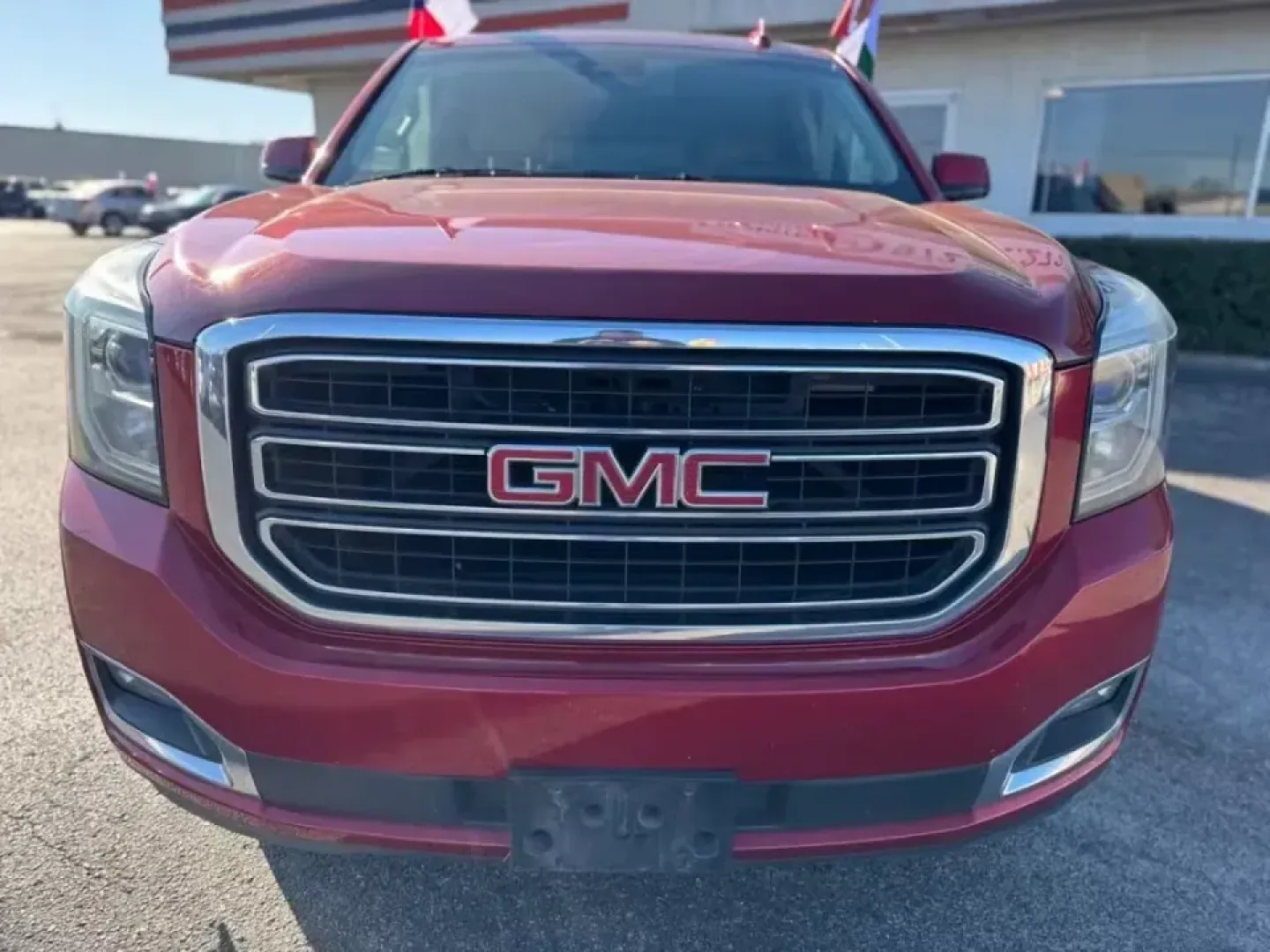 2015 RED GMC Yukon SLT 1/2 Ton 2WD (1GKS1HKC5FR) with an 5.3L V8 OHV 16V engine, 6-Speed Automatic transmission, located at 10740 Forest Lane, Dallas, TX, 75243, (972) 272-7300, 32.908588, -96.701813 - **Explore Adventure with the 2015 GMC Yukon XL: Your Family's Perfect Companion!**<br /> <br /> Are you ready to take on family road trips, weekend getaways, or even just your daily commute with style and comfort? Look no further than the 2015 GMC Yukon XL, a spacious and versatile SUV that perfectl - Photo#2