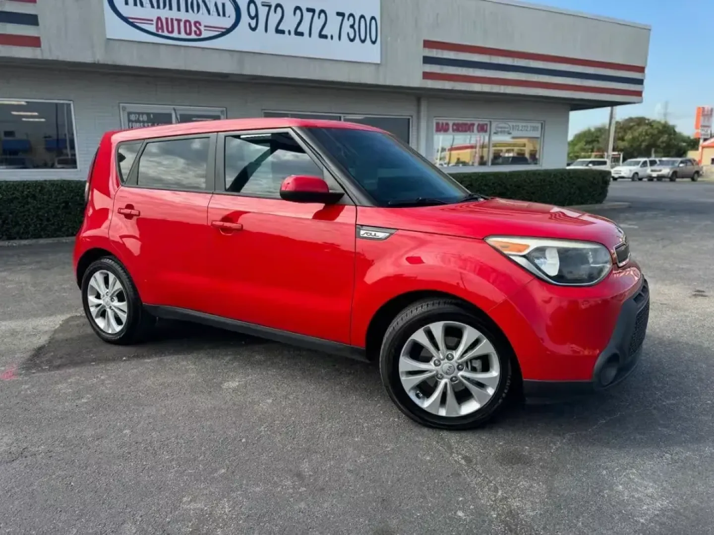 2015 RED Kia Soul + (KNDJP3A57F7) with an 2.0L L4 DOHC 16V engine, 6-Speed Automatic transmission, located at 10740 Forest Lane, Dallas, TX, 75243, (972) 272-7300, 32.908588, -96.701813 - Are you searching for a versatile vehicle that can keep up with your dynamic lifestyle? Look no further than this 2015 Kia Soul, a compact wagon perfect for everything from daily commutes to weekend getaways. With its spacious interior and excellent fuel efficiency, this vehicle truly embodies the s - Photo#2