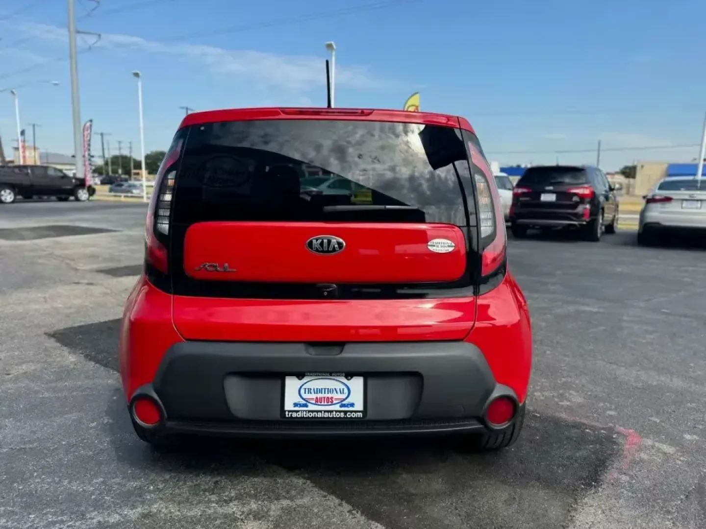 2015 RED Kia Soul + (KNDJP3A57F7) with an 2.0L L4 DOHC 16V engine, 6-Speed Automatic transmission, located at 10740 Forest Lane, Dallas, TX, 75243, (972) 272-7300, 32.908588, -96.701813 - Are you searching for a versatile vehicle that can keep up with your dynamic lifestyle? Look no further than this 2015 Kia Soul, a compact wagon perfect for everything from daily commutes to weekend getaways. With its spacious interior and excellent fuel efficiency, this vehicle truly embodies the s - Photo#4
