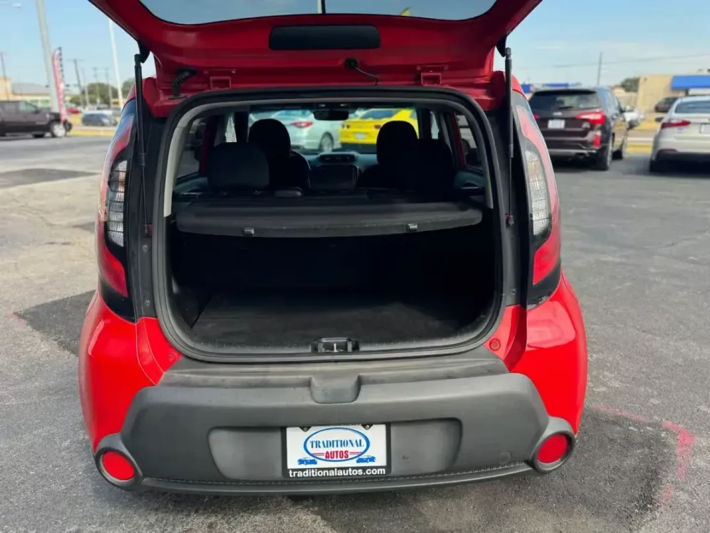 2015 RED Kia Soul + (KNDJP3A57F7) with an 2.0L L4 DOHC 16V engine, 6-Speed Automatic transmission, located at 10740 Forest Lane, Dallas, TX, 75243, (972) 272-7300, 32.908588, -96.701813 - Are you searching for a versatile vehicle that can keep up with your dynamic lifestyle? Look no further than this 2015 Kia Soul, a compact wagon perfect for everything from daily commutes to weekend getaways. With its spacious interior and excellent fuel efficiency, this vehicle truly embodies the s - Photo#5