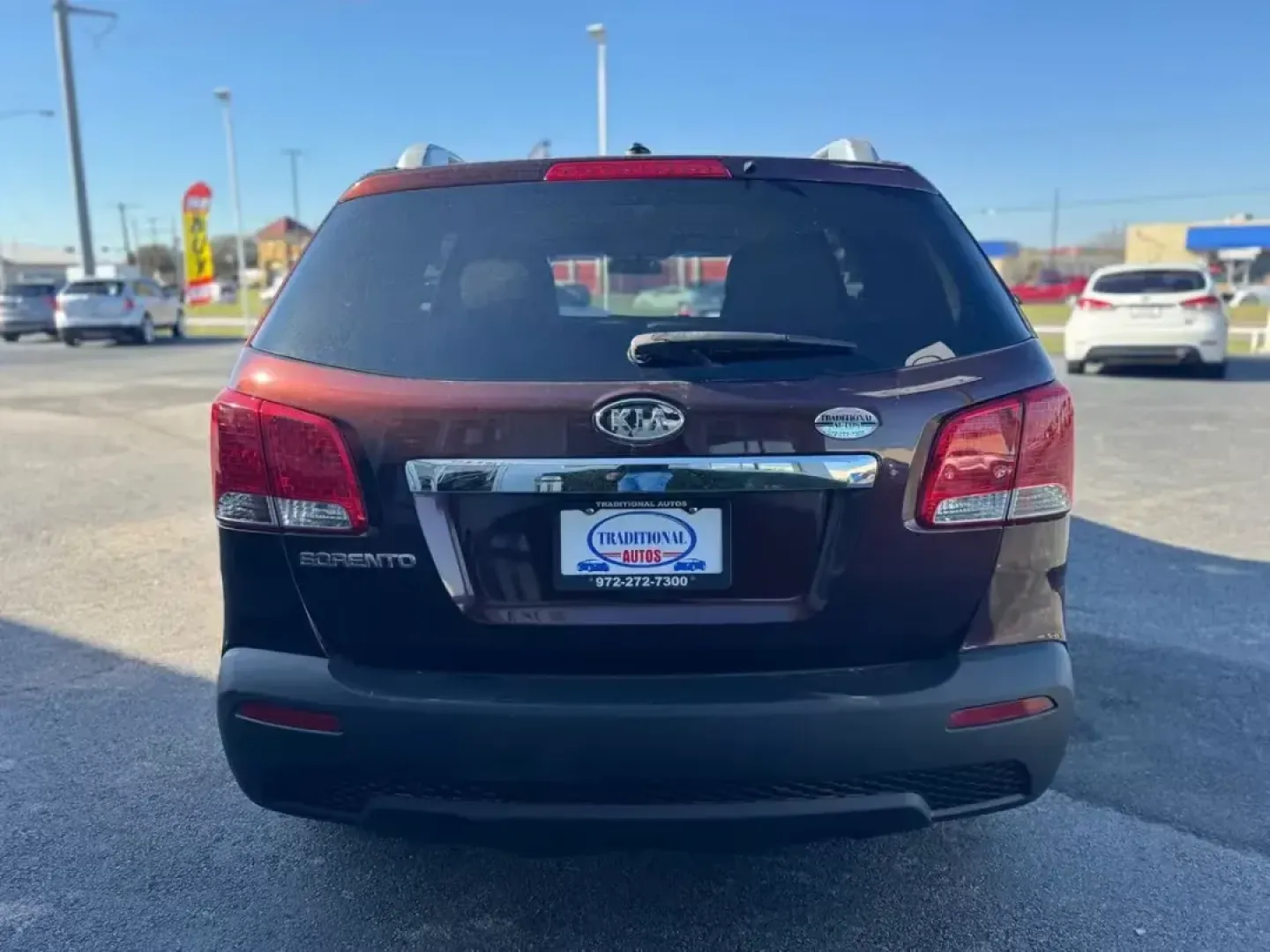 2011 MAROON Kia Sorento LX 2WD (5XYKT4A23BG) with an 3.5L V6 DOHC 24V engine, 6-Speed Automatic transmission, located at 10740 Forest Lane, Dallas, TX, 75243, (972) 272-7300, 32.908588, -96.701813 - Are you searching for a reliable, family-friendly SUV that fits seamlessly into your active lifestyle? Look no further than this 2011 Kia Sorento LX, now available at Traditional Autos in Dallas, TX. This remarkable pre-owned vehicle combines practicality, comfort, and style, making it the ideal cho - Photo#4