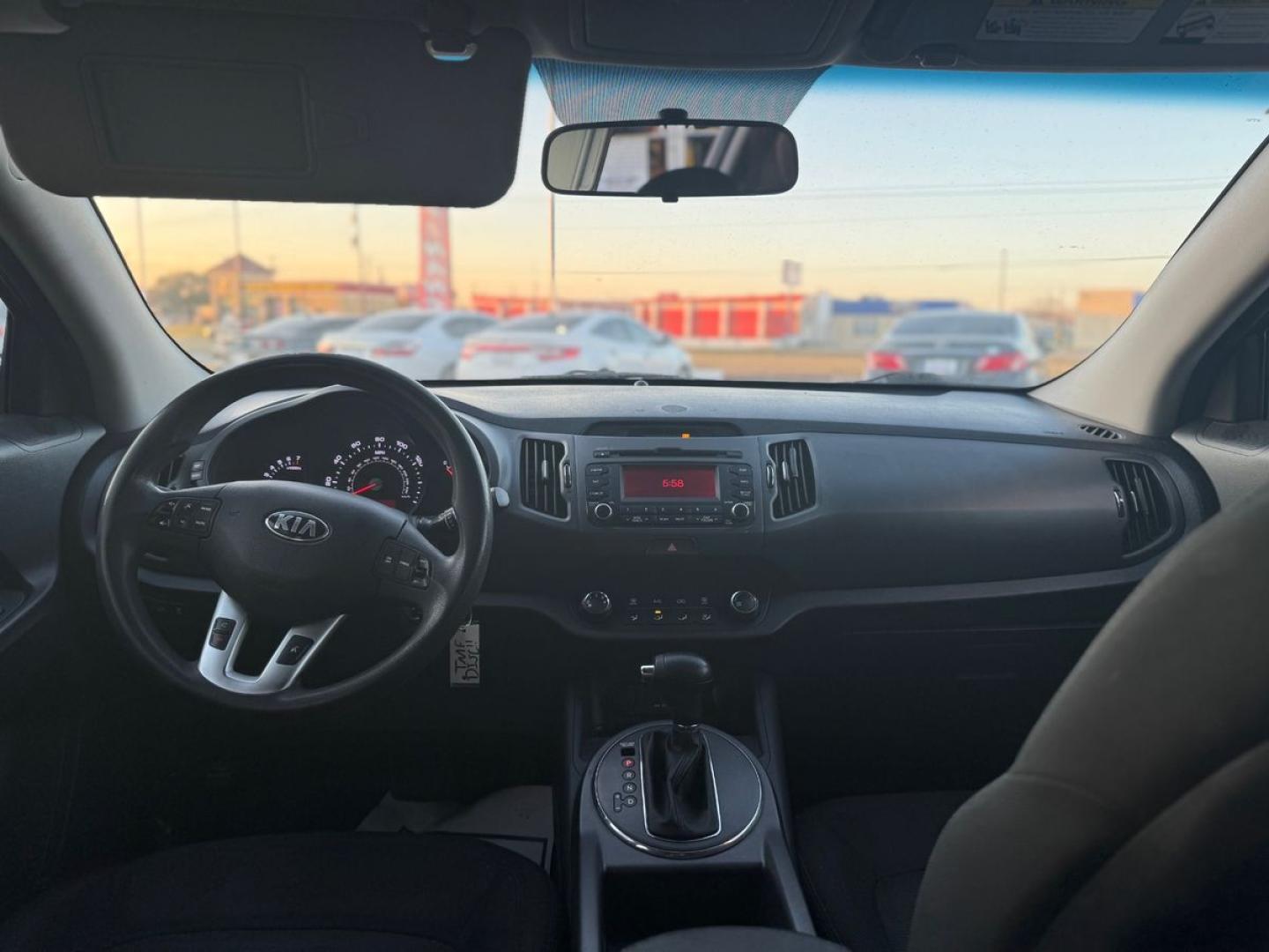 2013 BLACK /Gray KIA SPORTAGE BASE; EX; L LX FWD (KNDPB3A22D7) with an 2.4L V6 DOHC 24V engine, 6-Speed Automatic transmission, located at 10740 Forest Lane, Dallas, TX, 75243, (972) 272-7300, 32.908588, -96.701813 - Photo#5