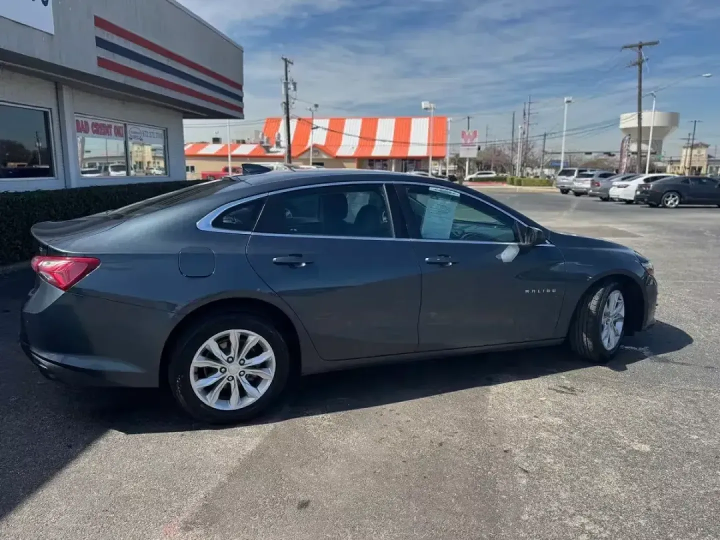2019 GRAY Chevrolet Malibu LT (1G1ZD5ST3KF) with an 1.5L L4 DOHC 16V engine, 6A transmission, located at 10740 Forest Lane, Dallas, TX, 75243, (972) 272-7300, 32.908588, -96.701813 - **Elevate Your Daily Commute with the 2019 Chevrolet Malibu LT - Your Ideal Sedan Awaits!**<br /> <br /> Are you looking for a reliable vehicle that seamlessly fits into your busy lifestyle? The 2019 Chevrolet Malibu LT is the perfect choice for anyone seeking a comfortable and efficient ride for bo - Photo#3