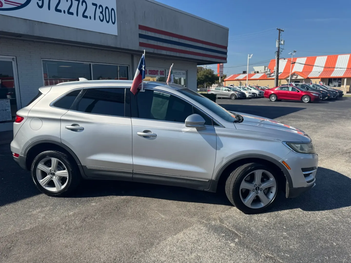 2015 SILVER Lincoln MKC FWD (5LMCJ1A96FU) with an 2.0L L4 DOHC 16V engine, 6-Speed Automatic transmission, located at 10740 Forest Lane, Dallas, TX, 75243, (972) 272-7300, 32.908588, -96.701813 - Experience the freedom of adventure with the 2015 Lincoln MKC, a perfect blend of luxury and capability that's ideal for weekend getaways and daily commutes alike. At Traditional Autos, located at 10740 Forest Lane, Dallas, TX 75243, we specialize in quality used vehicles, and this pre-owned SUV is - Photo#2