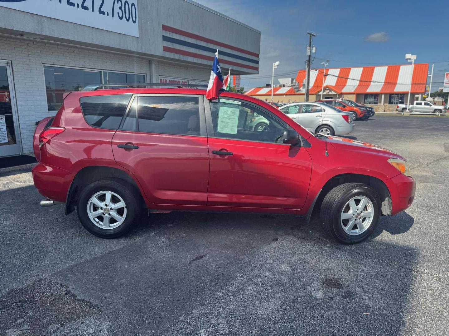 2007 RED TOYOTA RAV4 BASE Base I4 2WD (JTMZD33VX75) with an 2.4L L4 DOHC 16V engine, 4-Speed Automatic transmission, located at 10740 Forest Lane, Dallas, TX, 75243, (972) 272-7300, 32.908588, -96.701813 - Photo#2