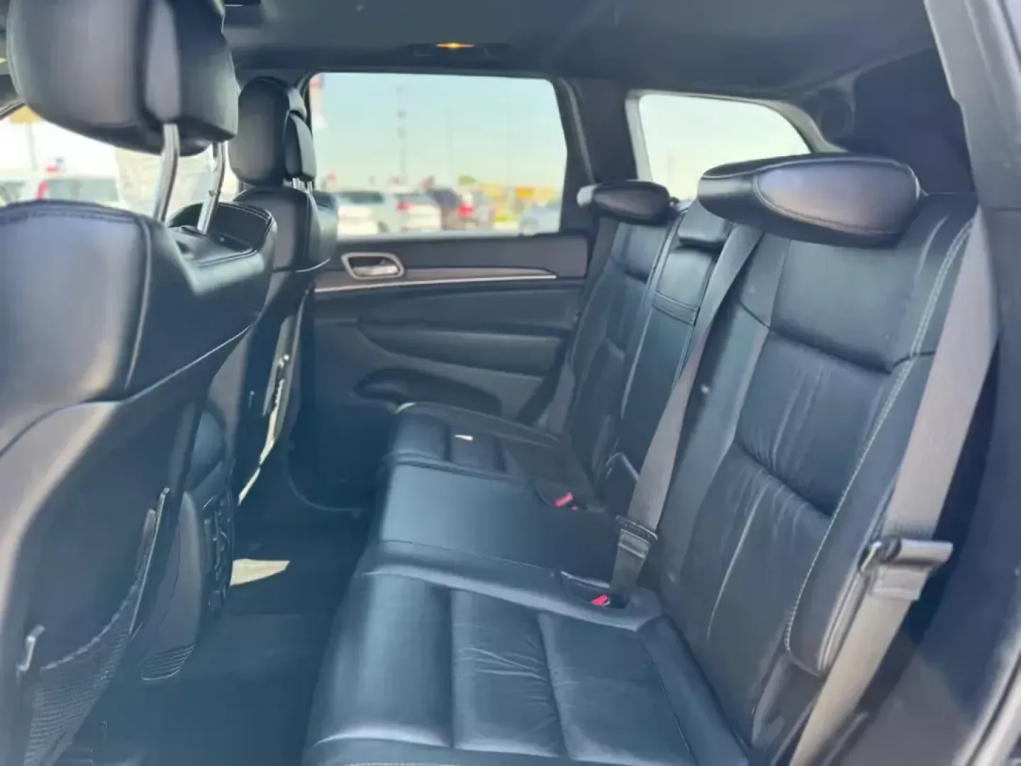 2014 BLACK Jeep Grand Cherokee Limited 2WD (1C4RJEBGXEC) with an 3.6L V6 DOHC 24V engine, 5-Speed Automatic transmission, located at 10740 Forest Lane, Dallas, TX, 75243, (972) 272-7300, 32.908588, -96.701813 - Are you ready to elevate your adventures? This 2014 Jeep Grand Cherokee Limited 2WD is the perfect blend of style and performance, making it an ideal companion for weekend getaways or daily commutes. Whether you're headed to the vibrant streets of Dallas or exploring nearby attractions like White Ro - Photo#5