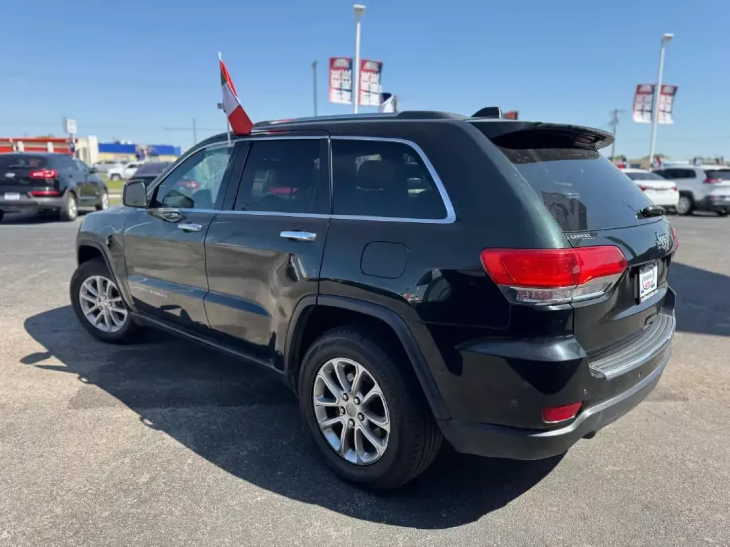 2014 BLACK Jeep Grand Cherokee Limited 2WD (1C4RJEBGXEC) with an 3.6L V6 DOHC 24V engine, 5-Speed Automatic transmission, located at 10740 Forest Lane, Dallas, TX, 75243, (972) 272-7300, 32.908588, -96.701813 - Are you ready to elevate your adventures? This 2014 Jeep Grand Cherokee Limited 2WD is the perfect blend of style and performance, making it an ideal companion for weekend getaways or daily commutes. Whether you're headed to the vibrant streets of Dallas or exploring nearby attractions like White Ro - Photo#6