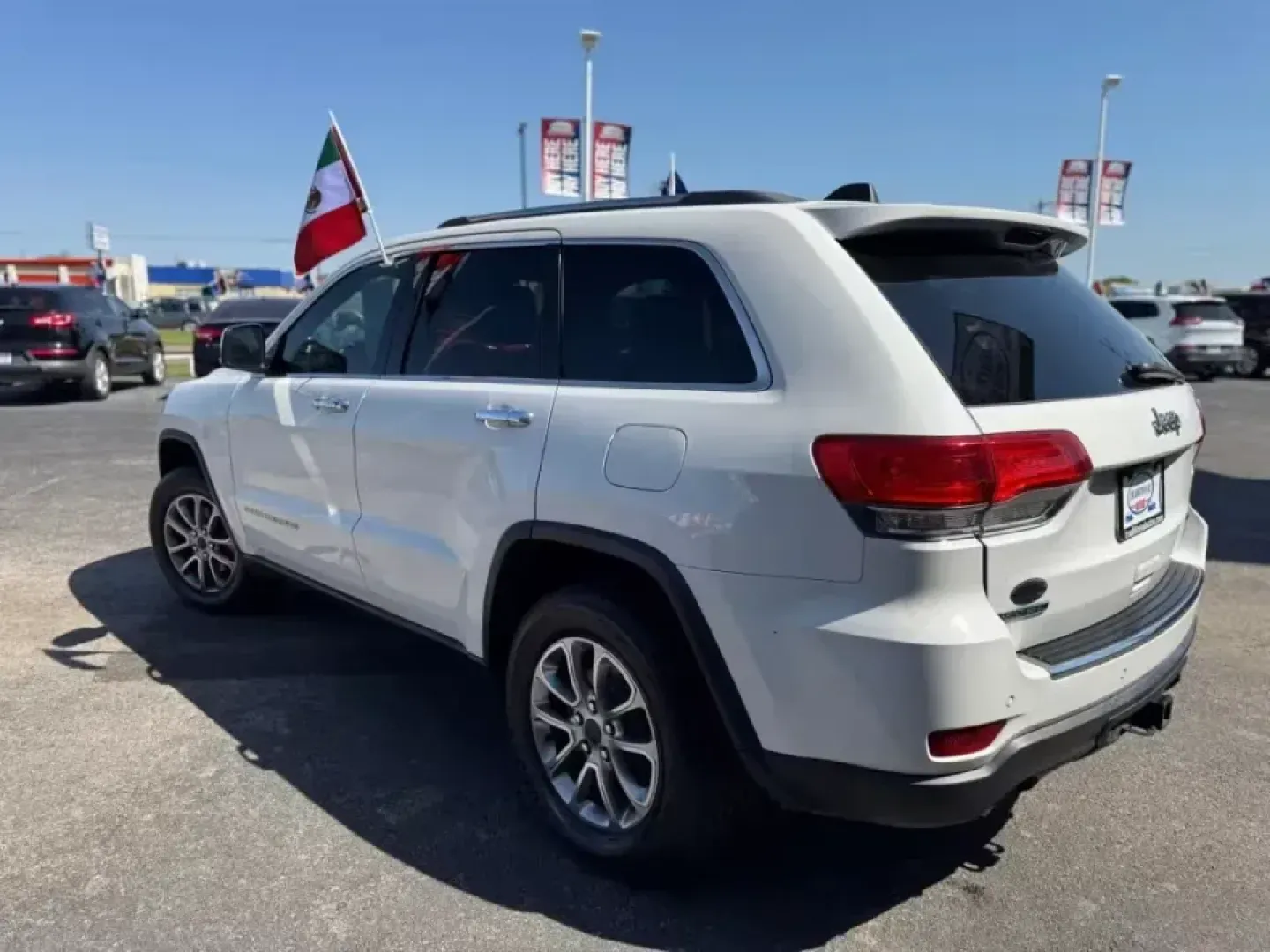 2014 WHITE Jeep Grand Cherokee Limited 2WD (1C4RJEBM5EC) with an 3.0L V6 DOHC 24V DIESEL engine, 5-Speed Automatic transmission, located at 10740 Forest Lane, Dallas, TX, 75243, (972) 272-7300, 32.908588, -96.701813 - **Adventure Awaits with This 2014 Jeep Grand Cherokee Limited!**<br /> <br /> Are you ready to elevate your weekend adventures or enhance your daily commute? Look no further! At Traditional Autos in Dallas, TX, we present the 2014 Jeep Grand Cherokee Limited a vehicle that seamlessly blends rugged - Photo#4